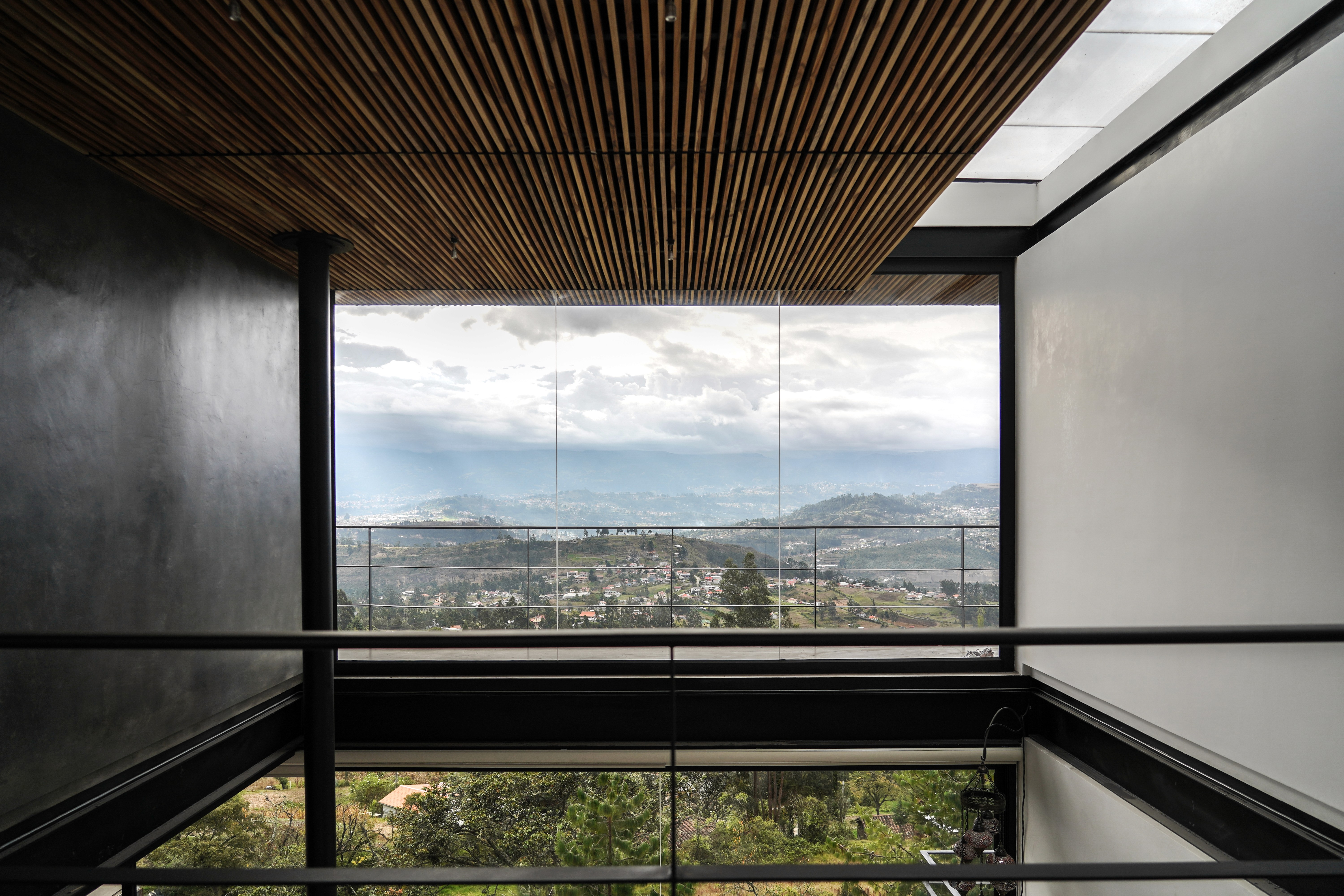 Doble altura con vista a las montañas