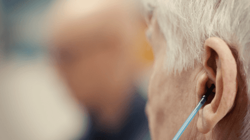 a man holding a cocktail