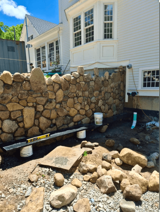 The building of a stone retaining wall