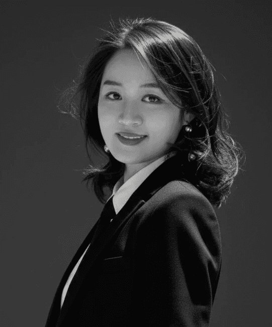 a woman with long hair wearing a blue blazer (Background Removed)