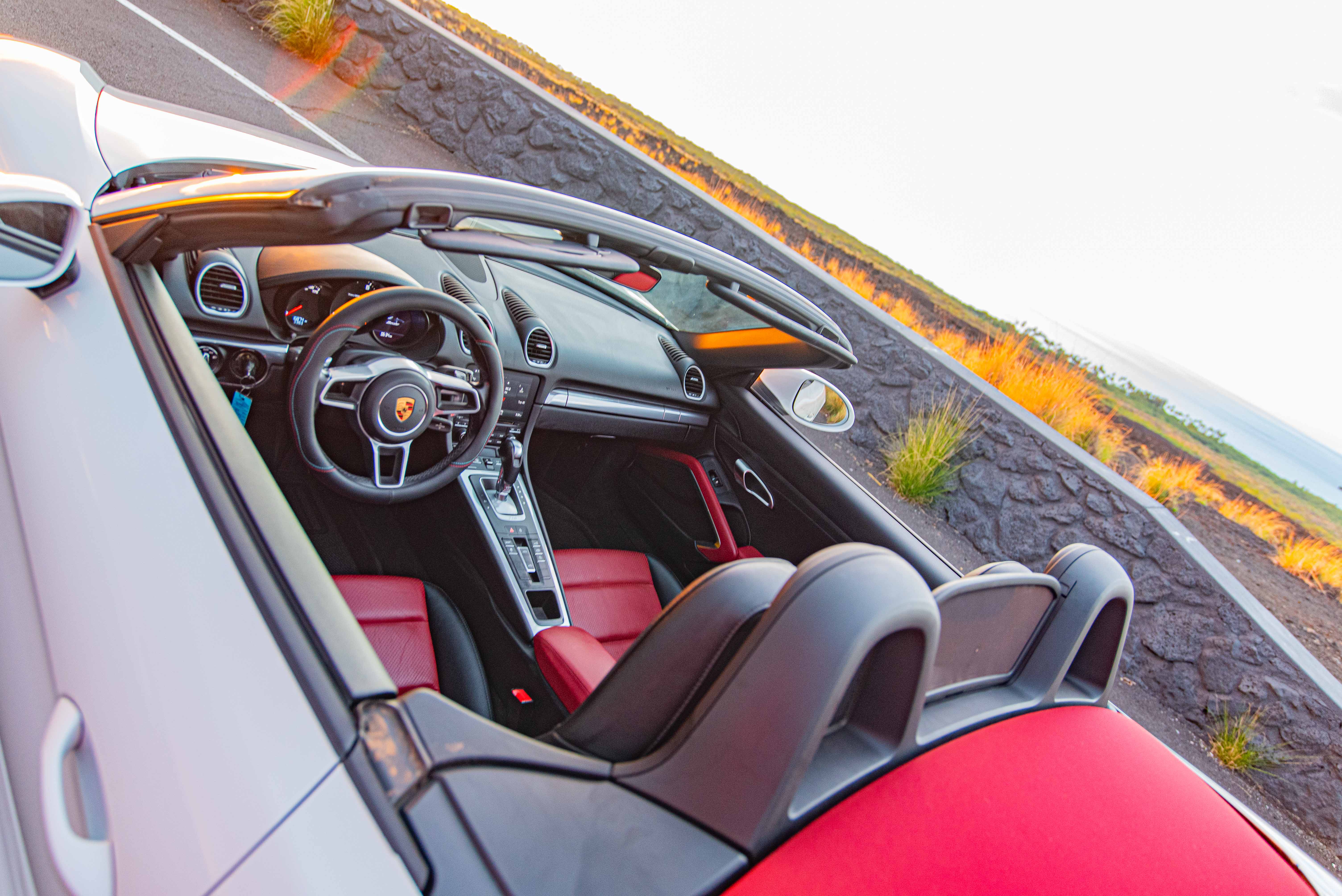 White Porsche Boxster Under Sunset Hawaii Big Island For Rent