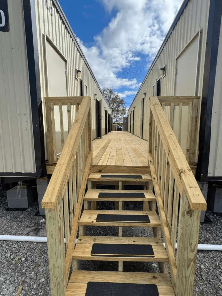 Stair entry leading to modular housing units at the Ochsner Chabert emergency housing site.