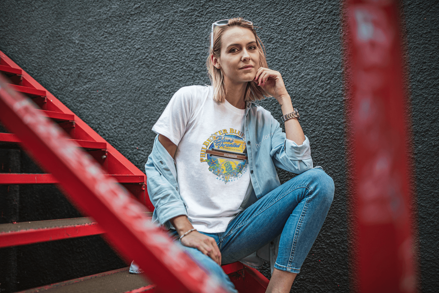 Woman leaning against wall