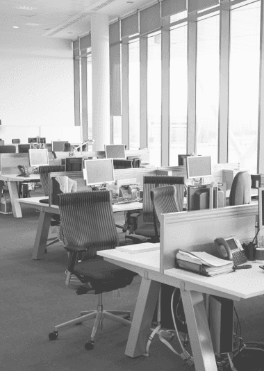 Empty desks with computers in an office