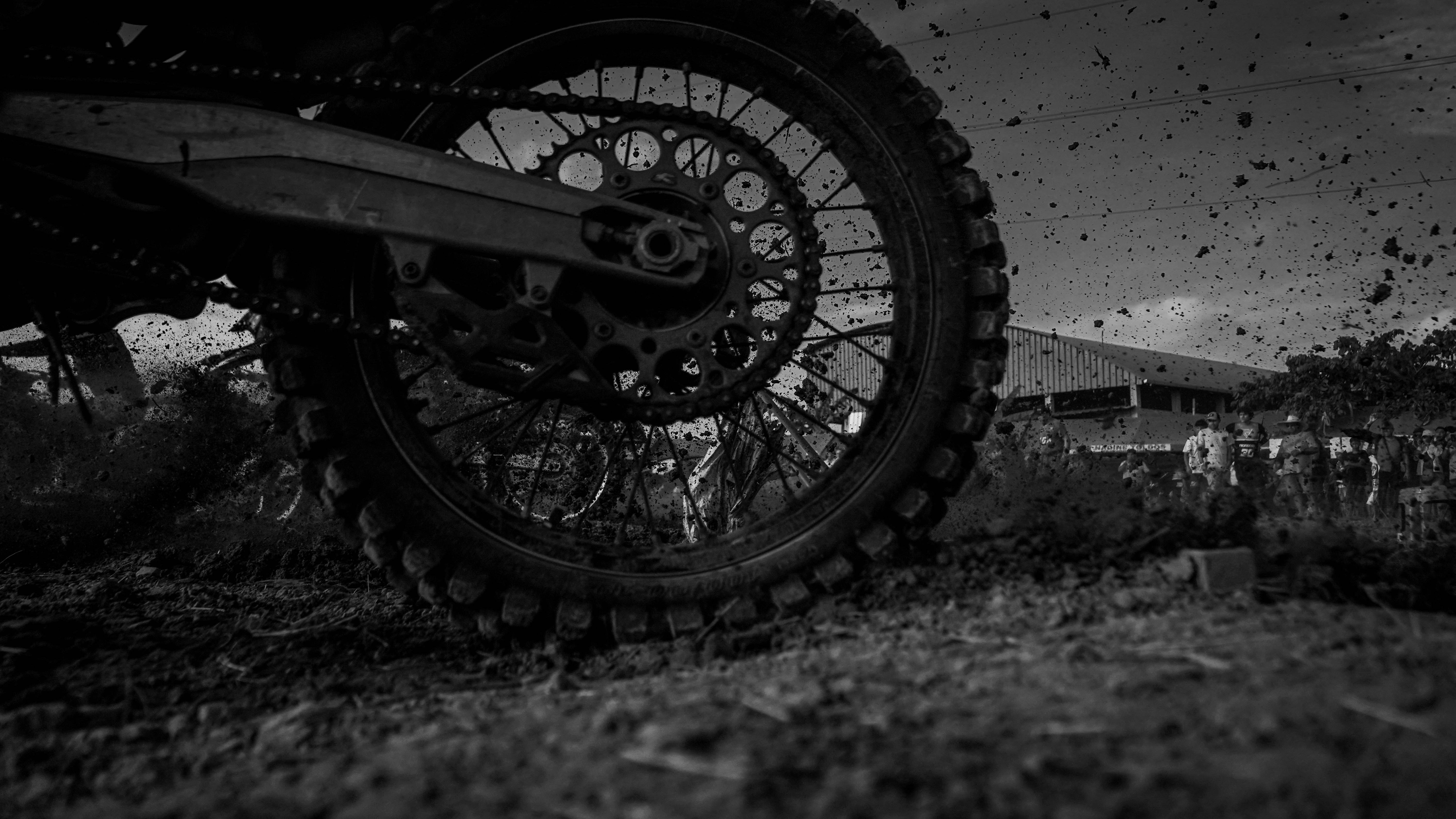 A black and white photo of a dirt bike tire