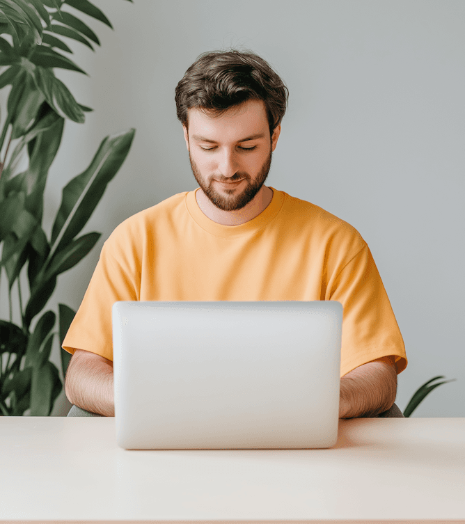 Man reading on laptop