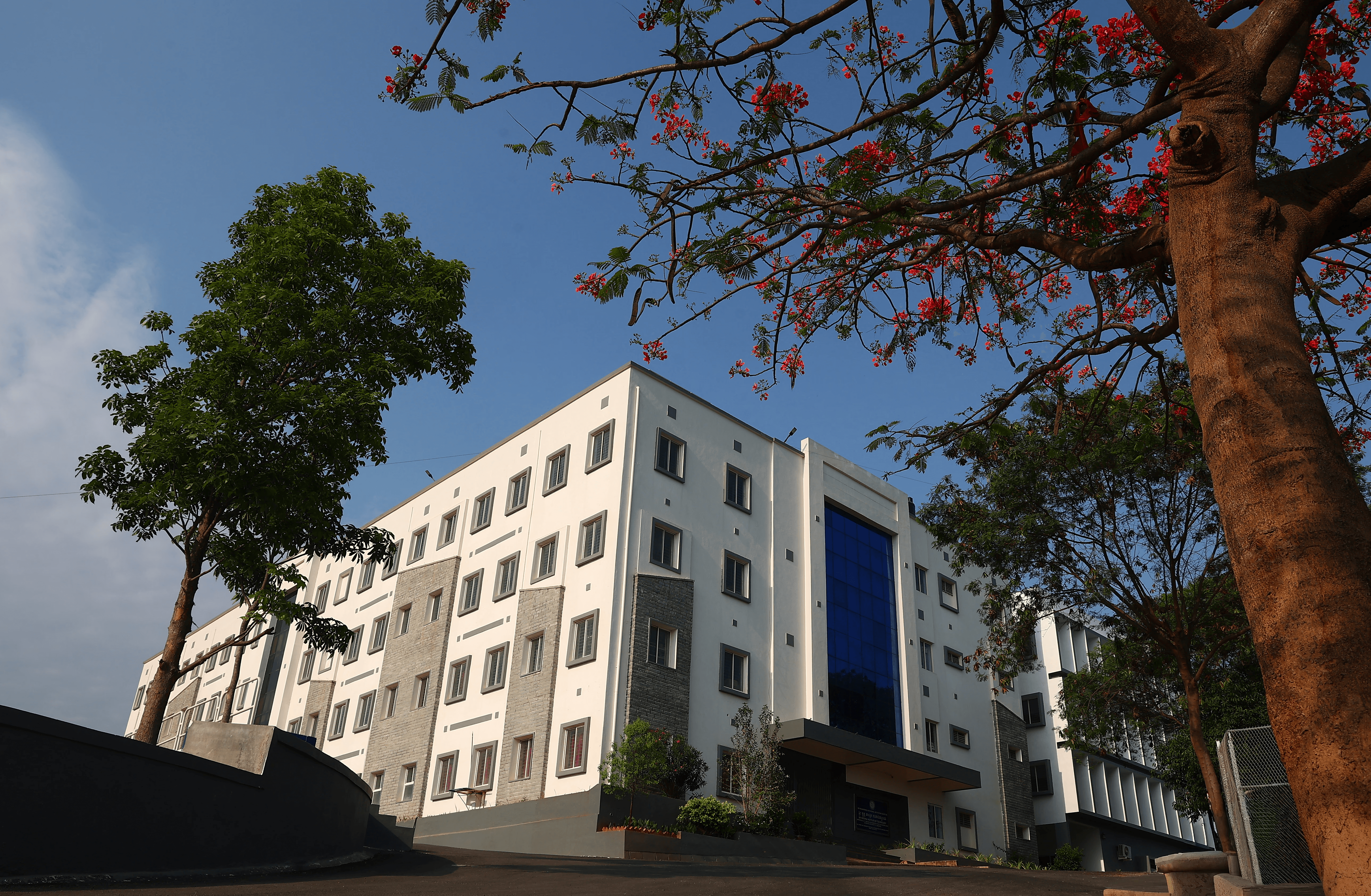 A gradient image transitioning from dark black to light gray tones.