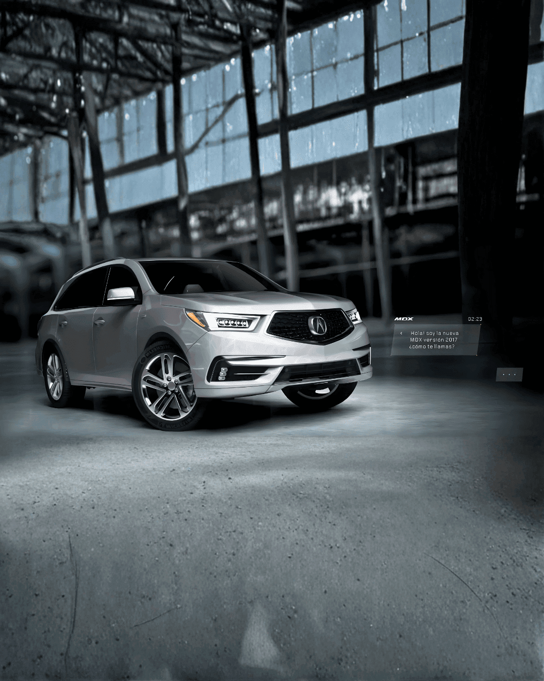 Silver 2017 Acura MDX SUV in an industrial building.