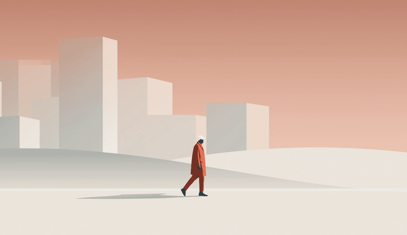 Two men discuss a project while standing at a laptop in an office.