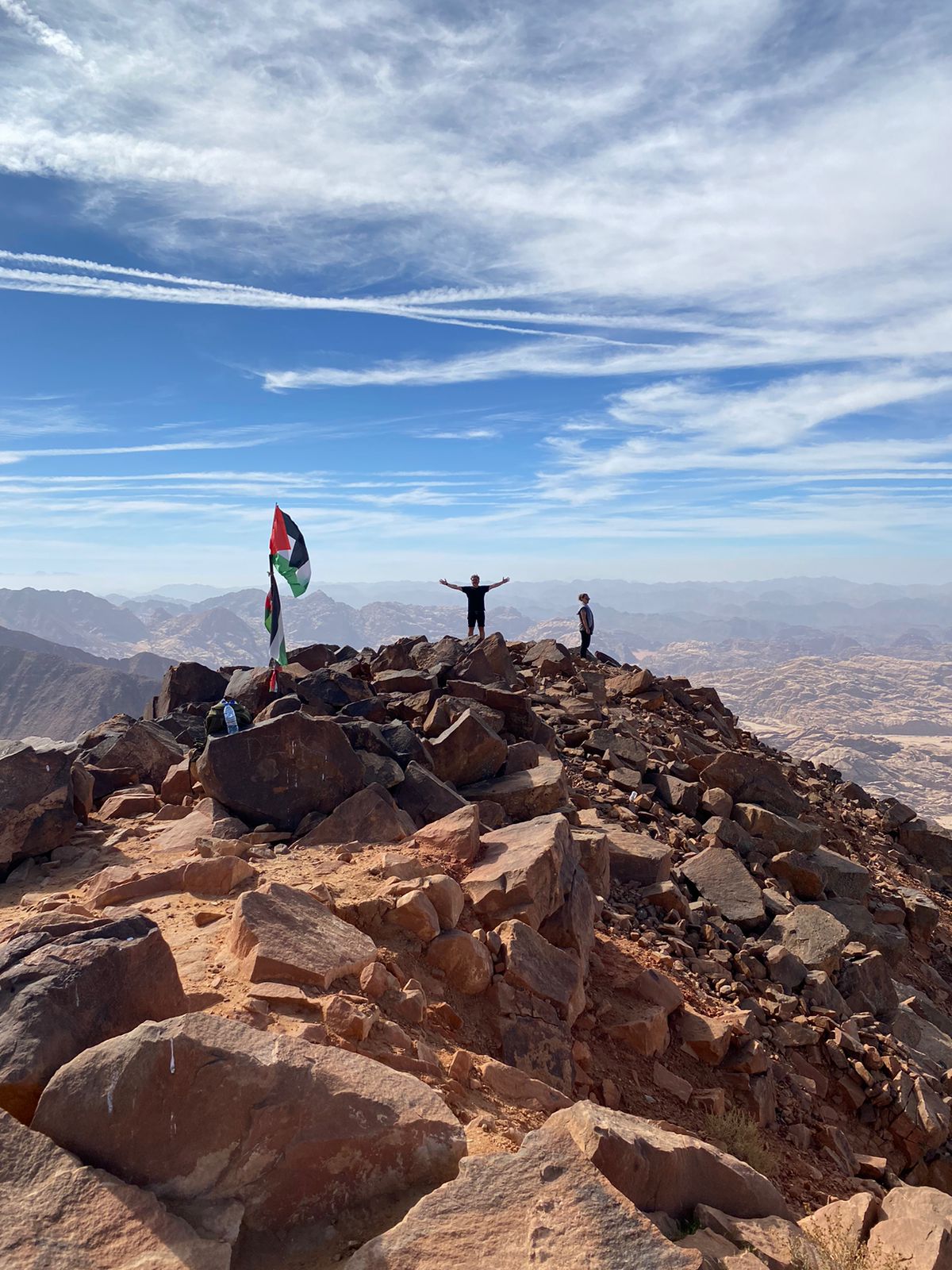 Our guests posing on top of Jabal Um Adami in Wadi Rum, Jordan