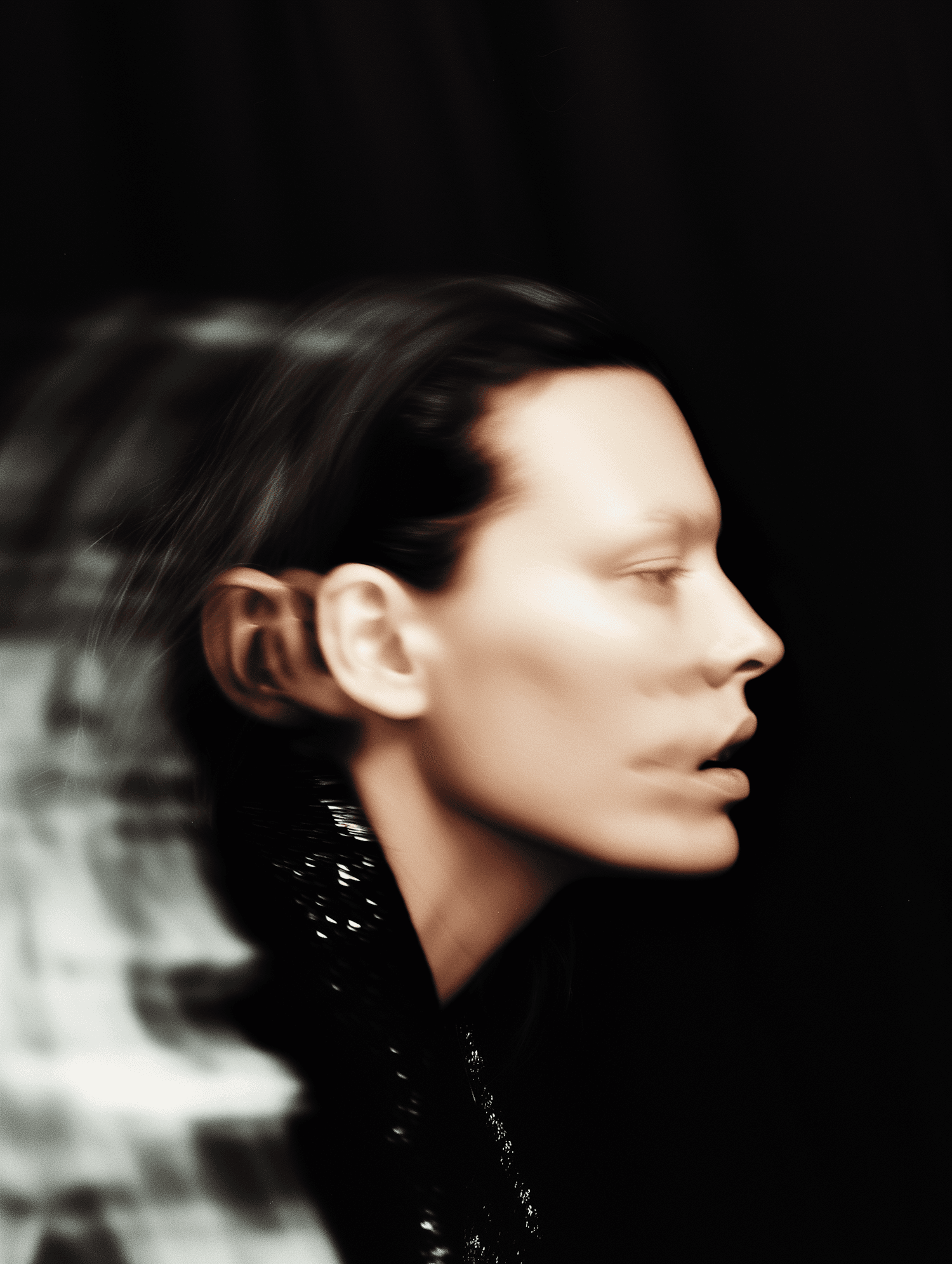 Woman in profile with short hair