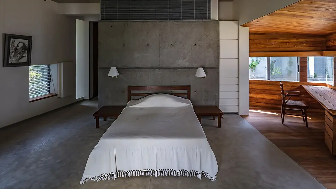 Brutalism and unfinished style bedroom interior design at House of Stories, Bangalore