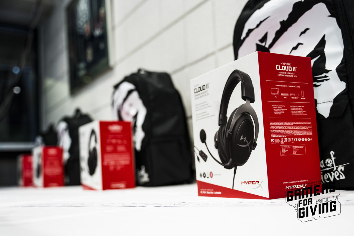 HyperX Cloud II headsets in lined up with VIP bags at Gamers for Giving 2023 LAN event.