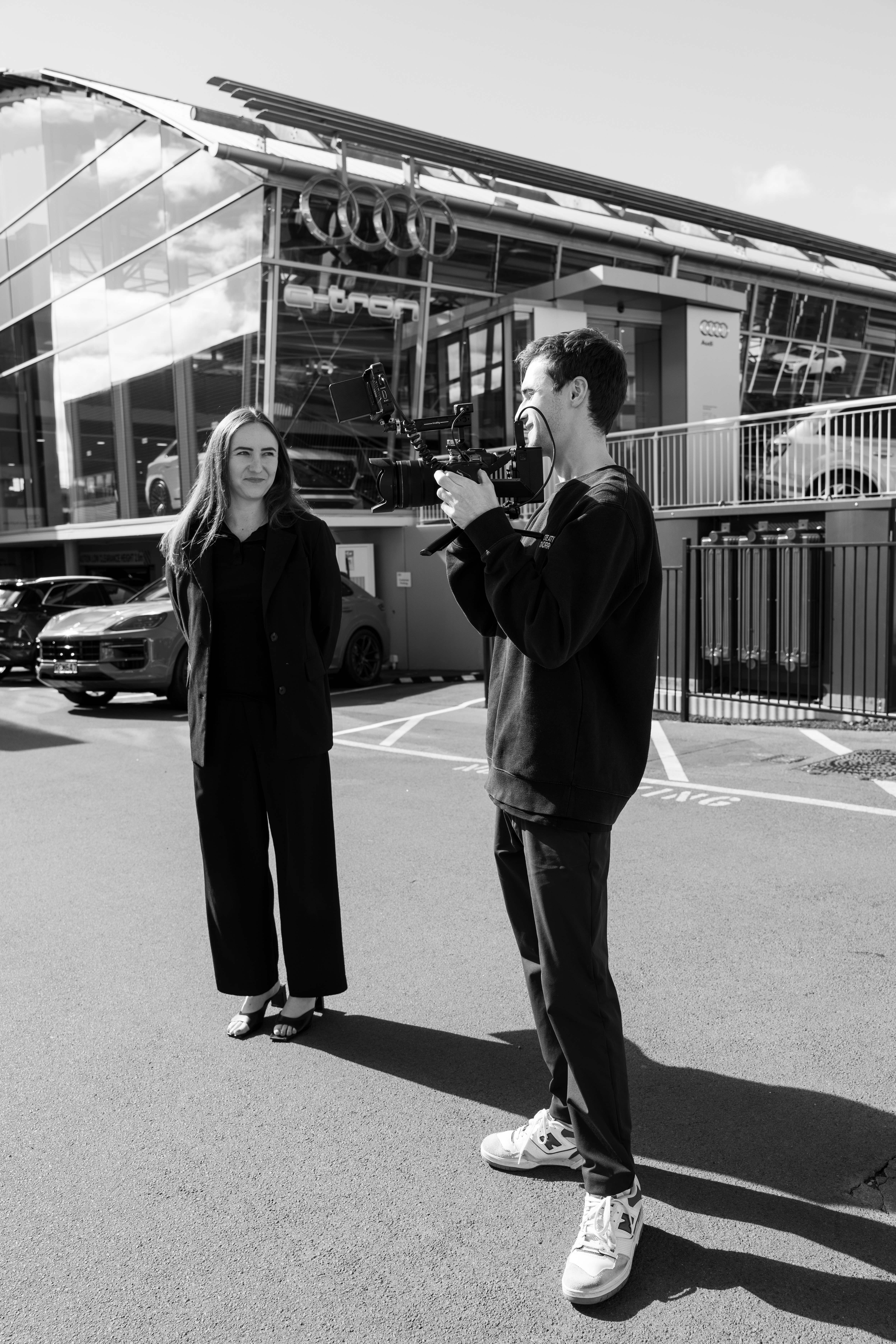 Streetside billboard with flyposters of the Batch.Works brand and illustrations