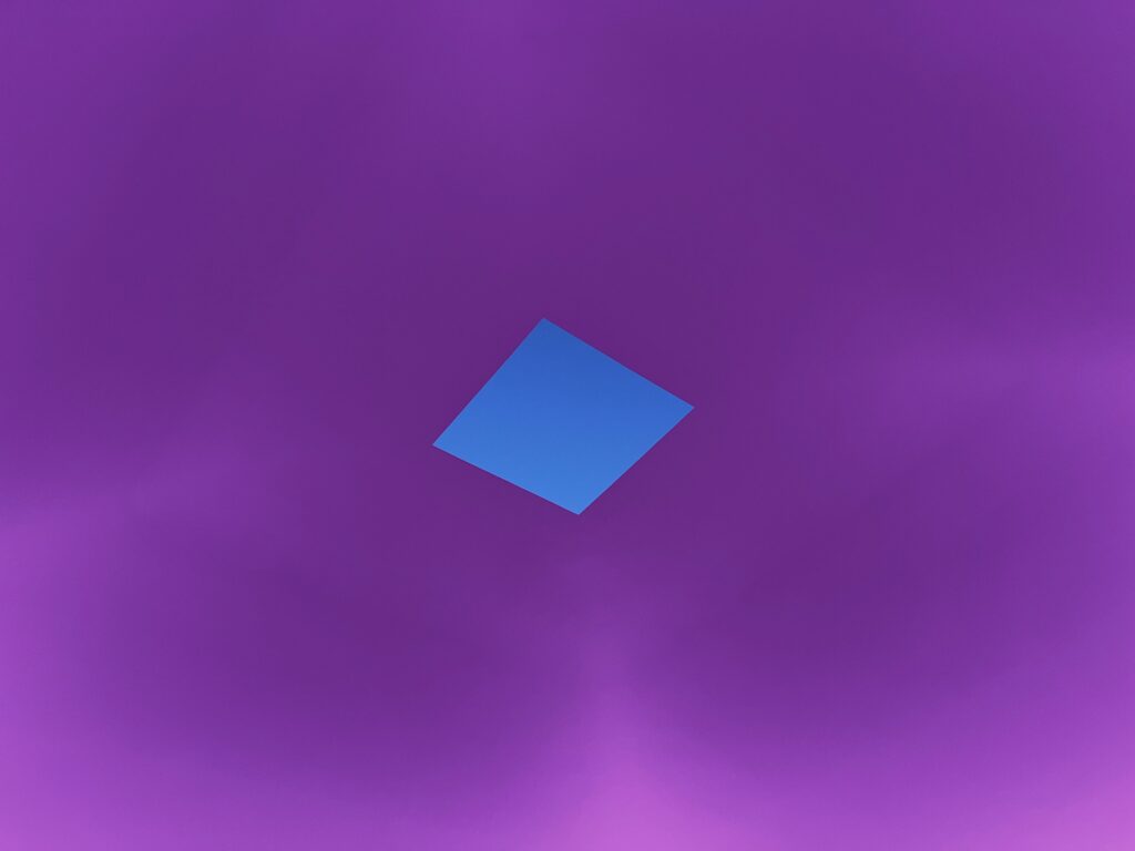 The square roof aperture of Come to Good, open to the sky above a lit dome