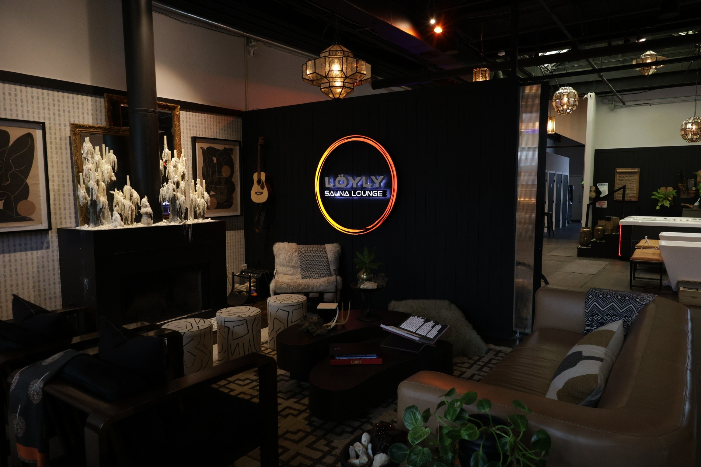A cozy scene with warm sunlight casting stripes, featuring a potted plant and soft towels on a window sill.