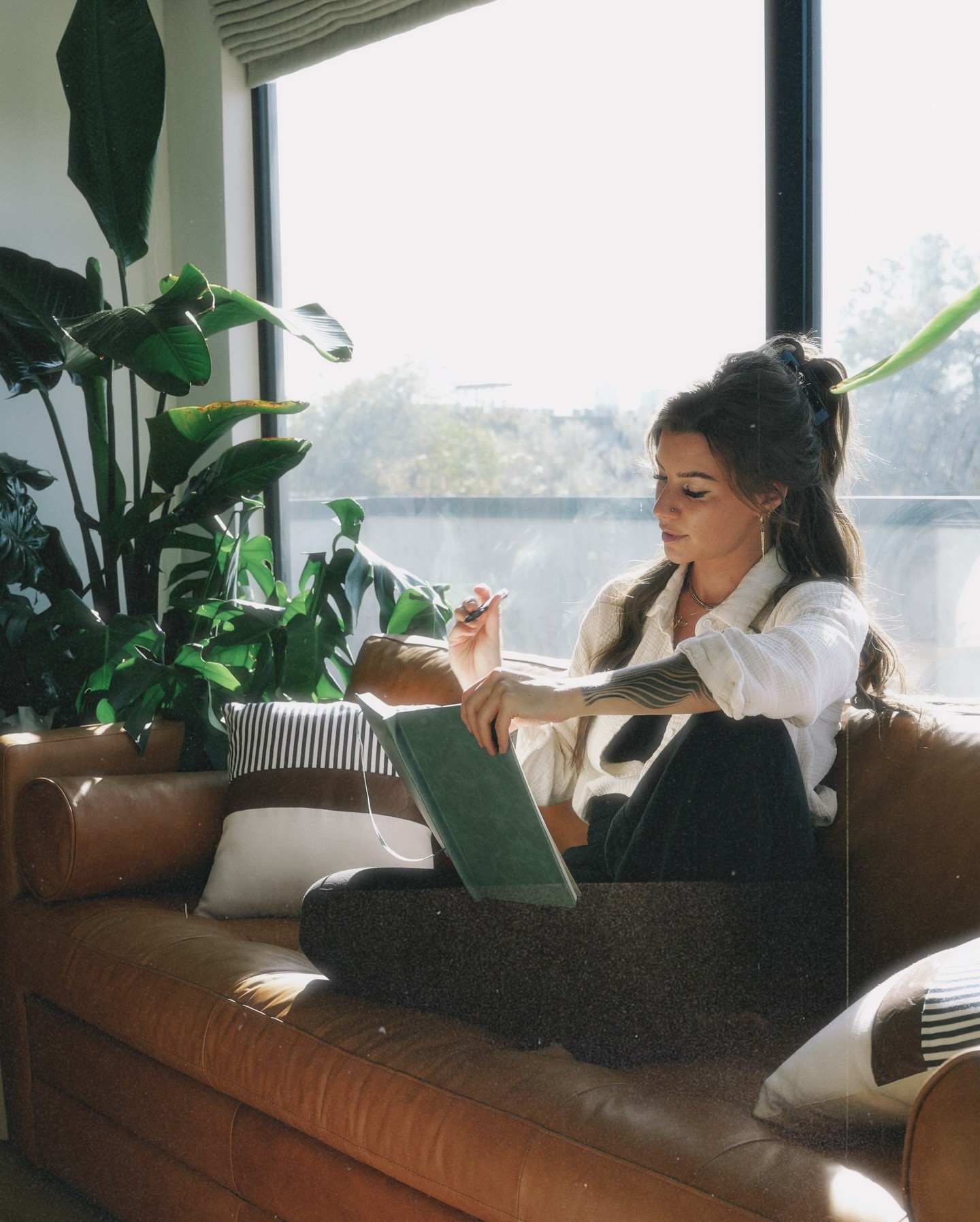 Woman practicing mindful breathwork with hands at heart center