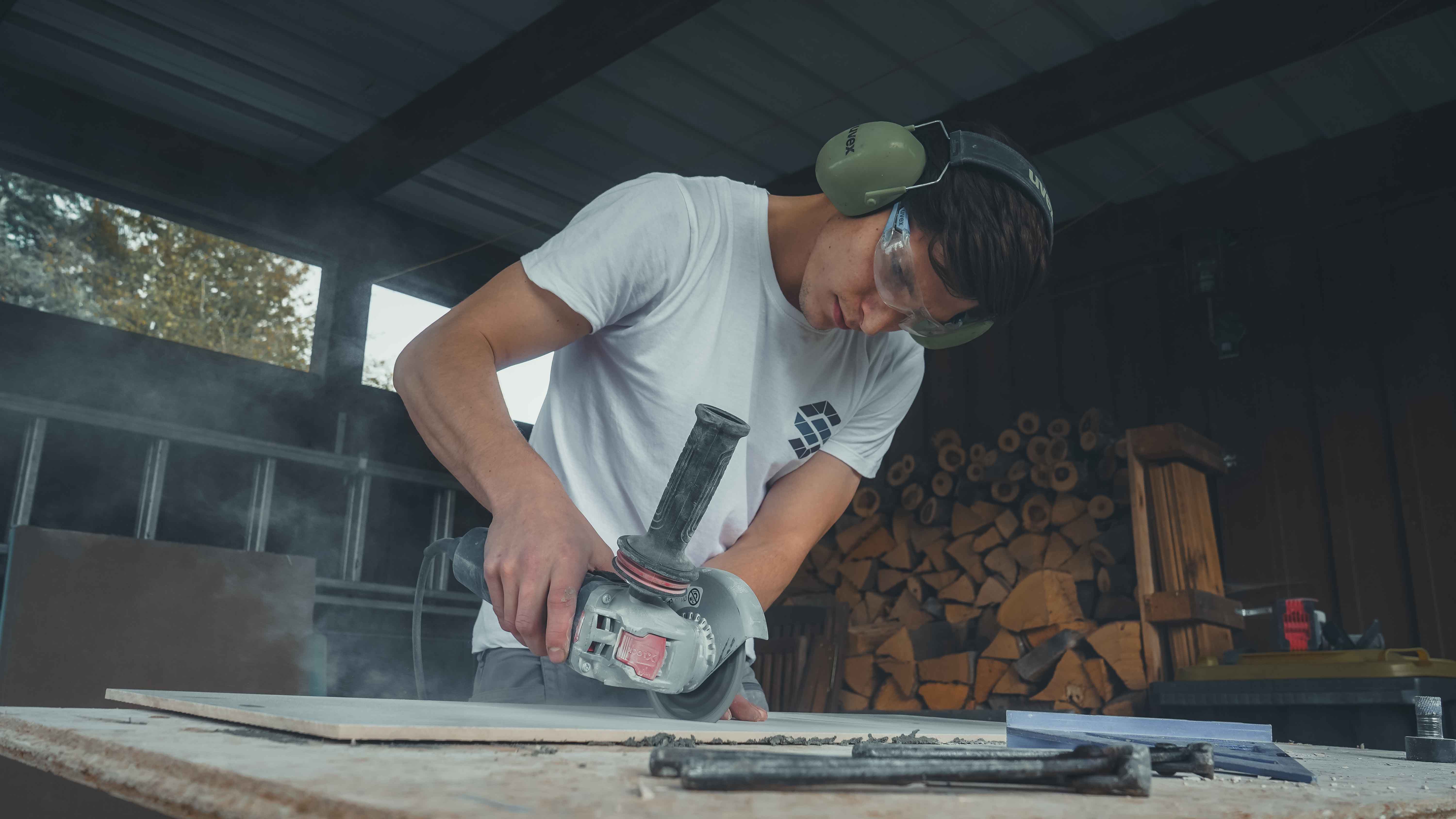 people sitting on chair in front of laptop computers