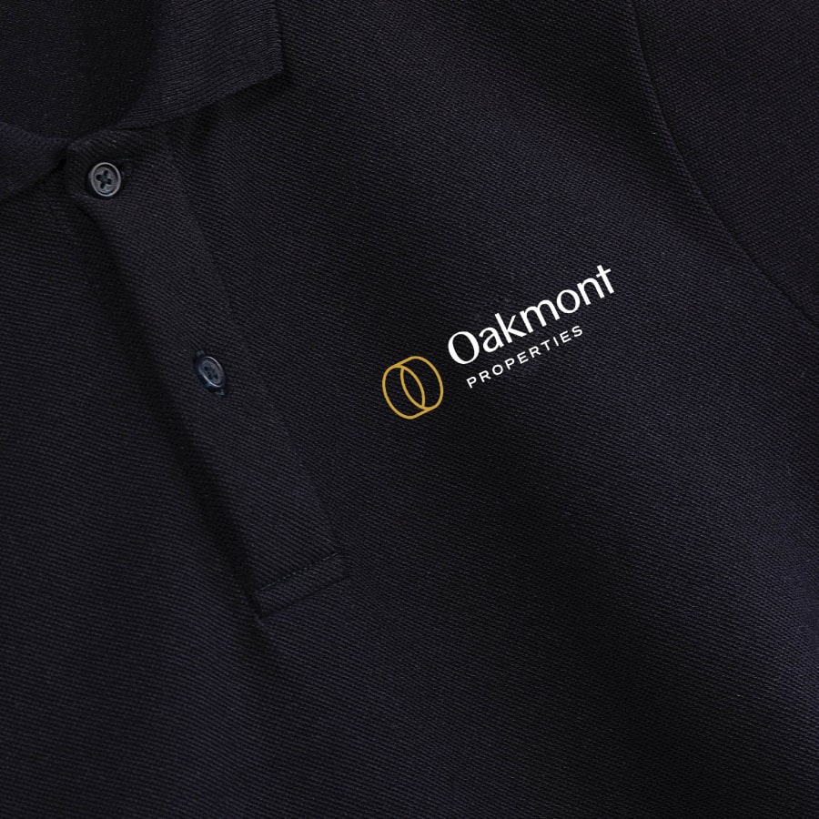 Oakmont-branded polo shirt.