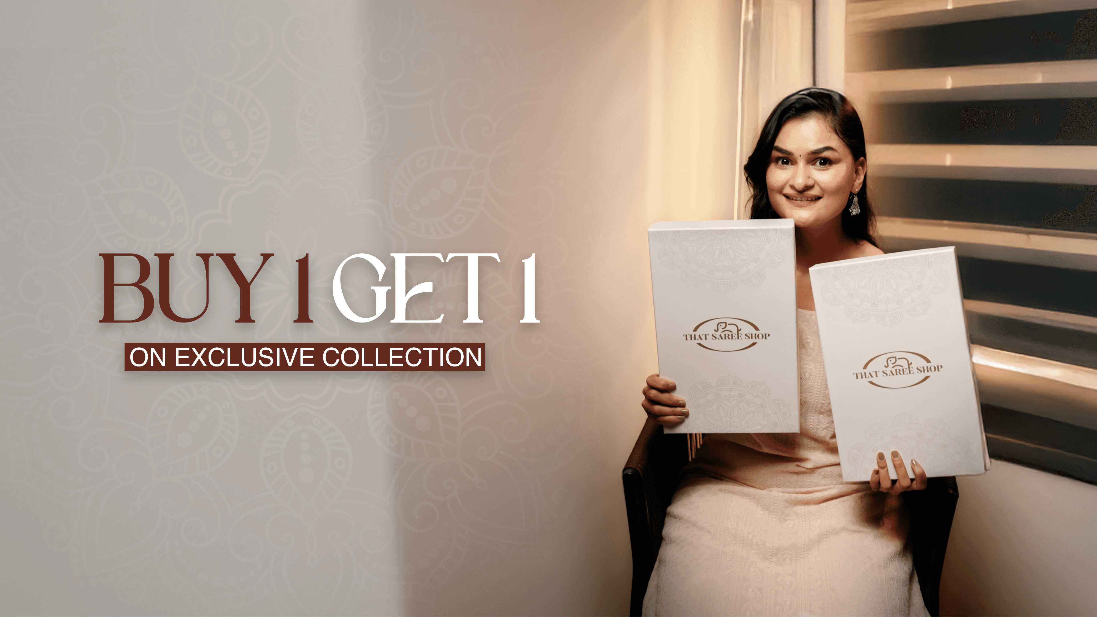 Two women wearing elegant sarees from That Saree Shop—one in pink and one in blue—standing gracefully on the grand royal staircase of a luxurious mansion.