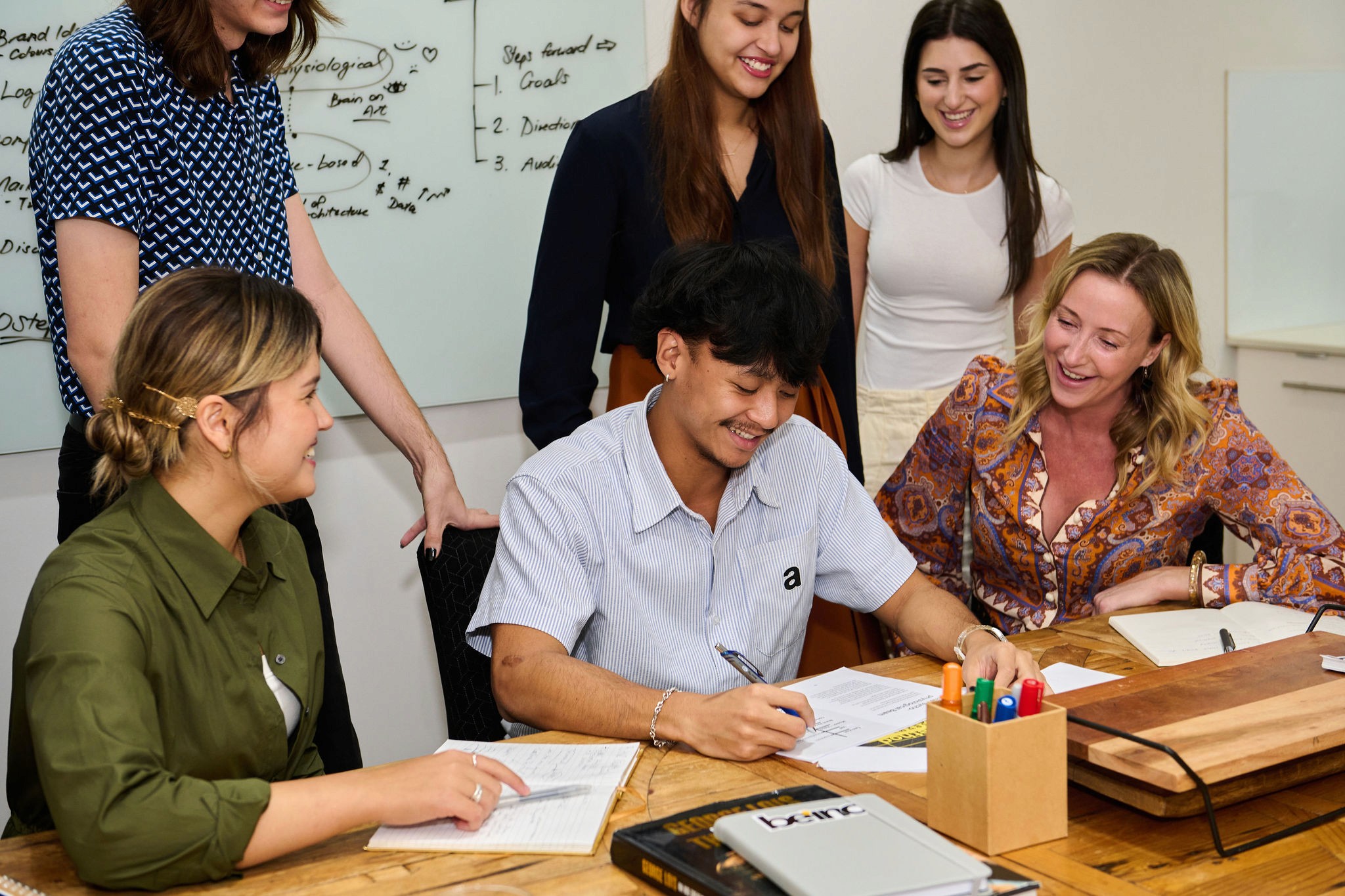 Dashboard showing MRR of $69,897 and 1206 active users with an upward trend graph.