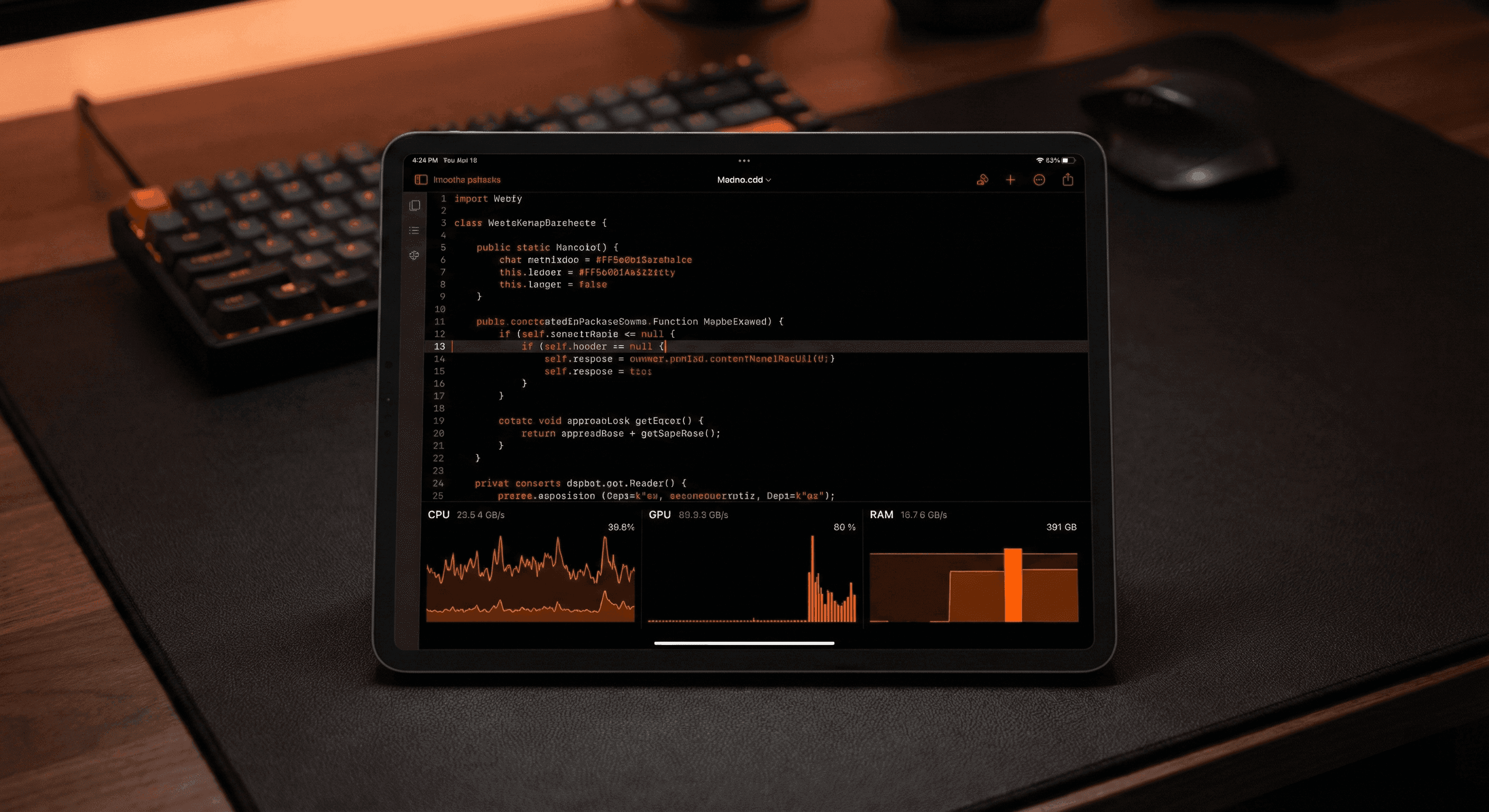 Tablet displaying code and graphs, with keyboard and mouse nearby.