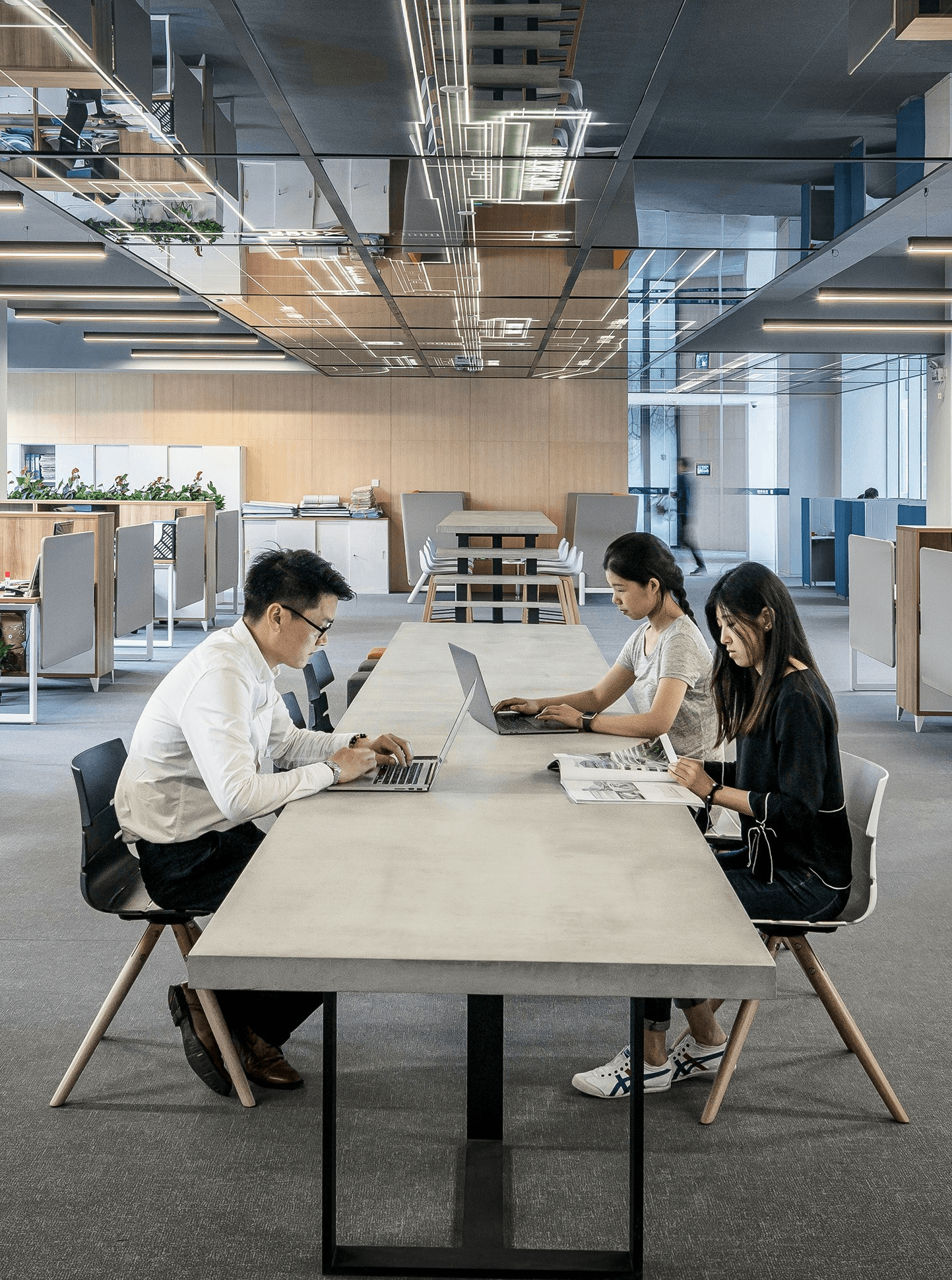man and woman sitting on table