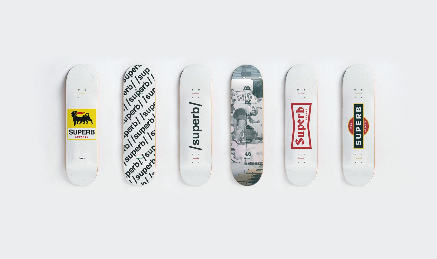 Skateboard decks on wall for Superb apparel