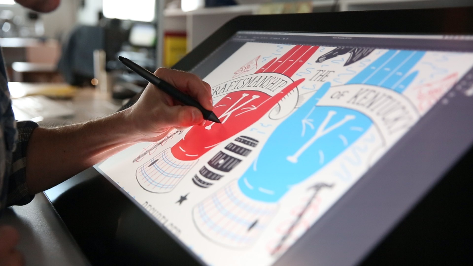 Image of Robby Davis drawing a t-shirt design