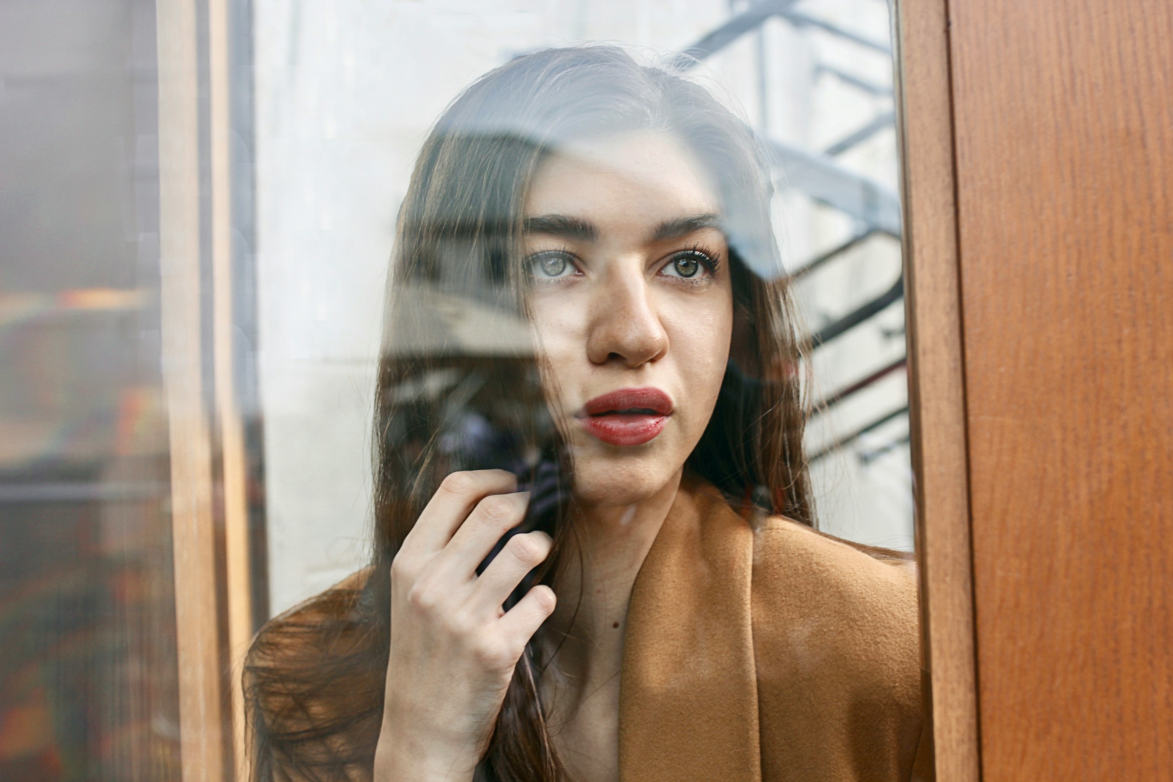 woman looking at window - Aesthetic Preppy 