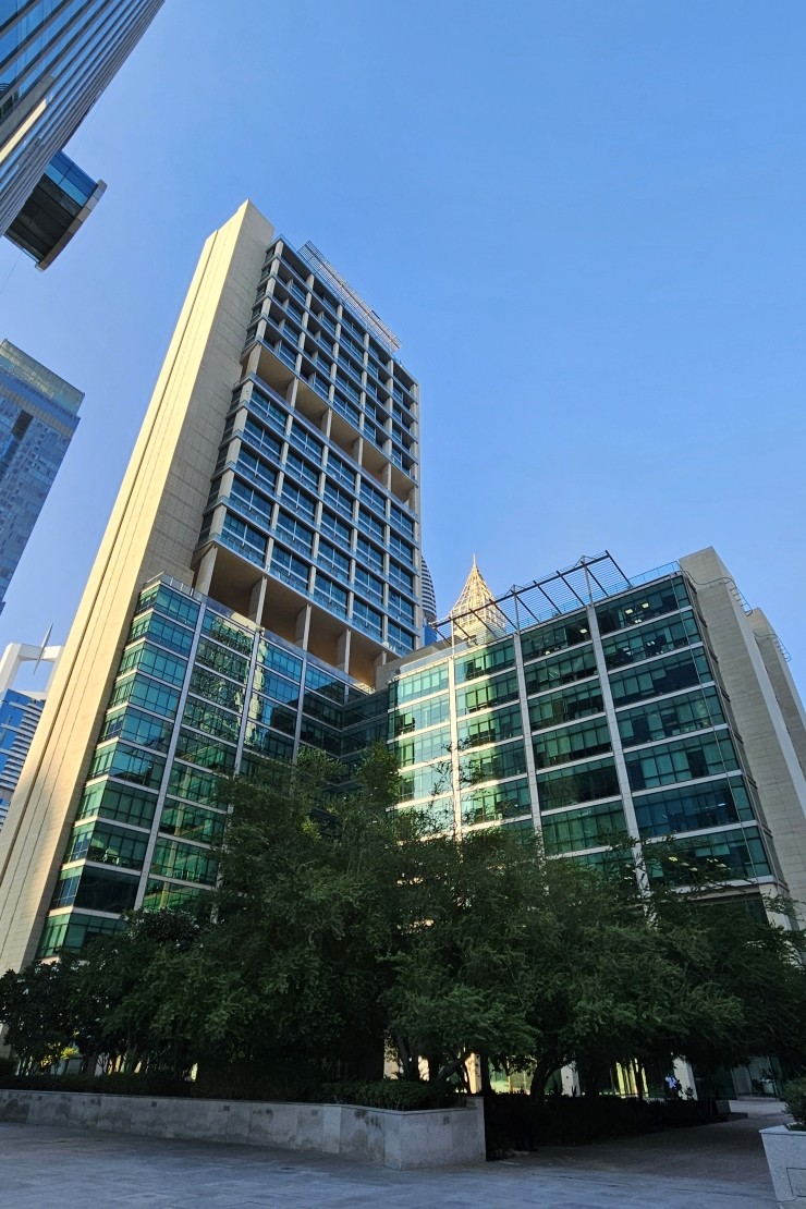 Modern glass facade of Liberty House. Contact our real estate agents for premium DIFC property listings.