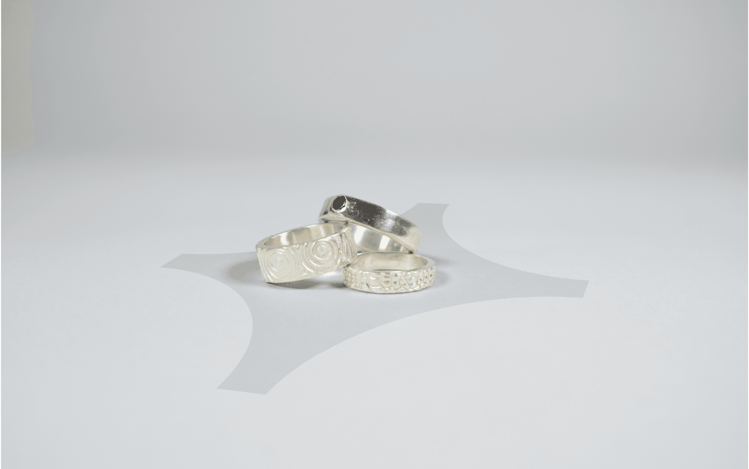 Three silver rings made by Jerry Rings