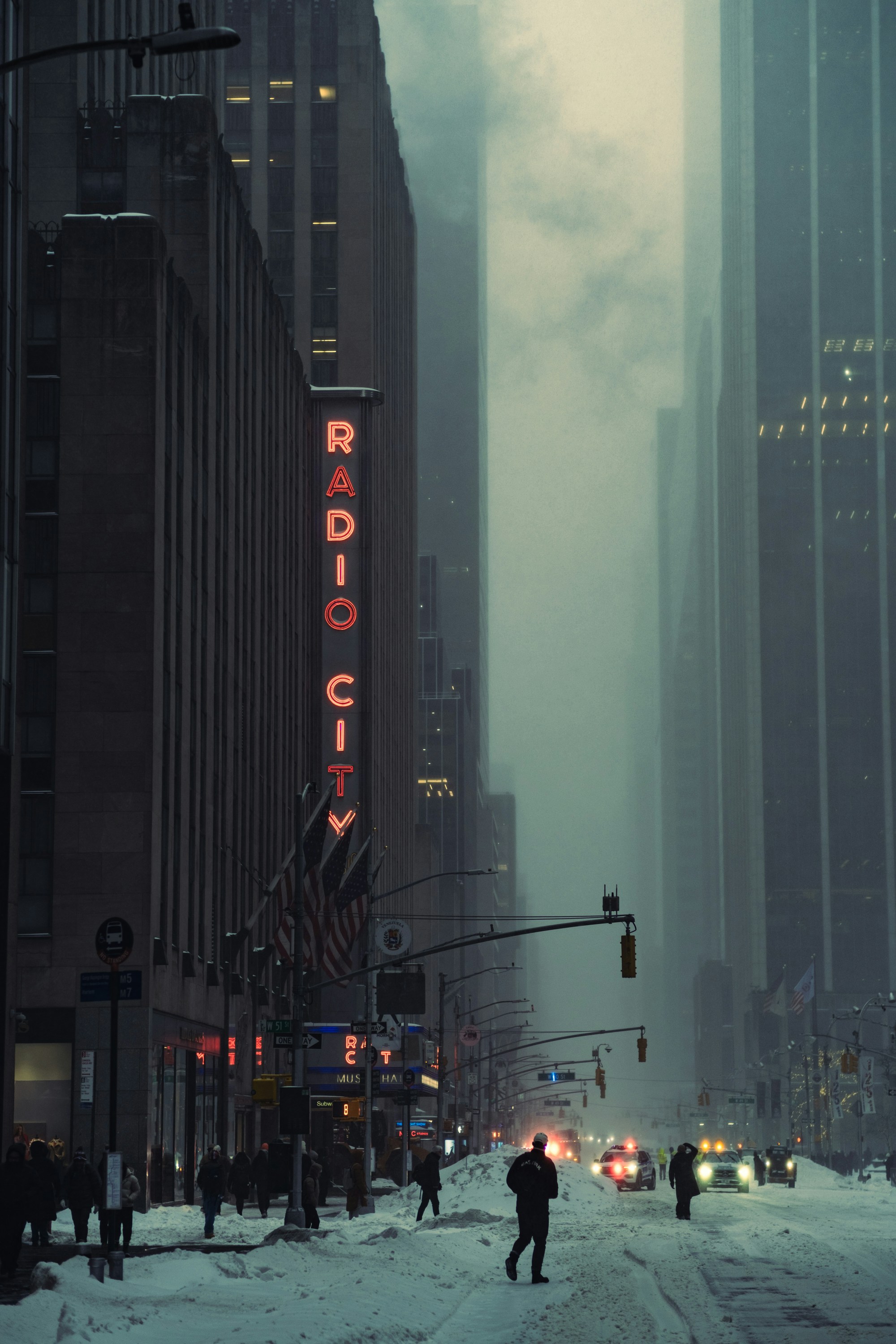 Radio city music hall in a snowy new york city.