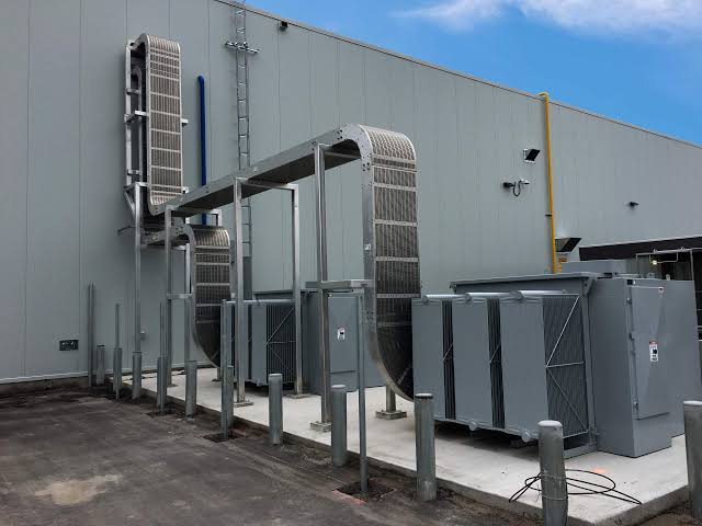 Power Bus Way large scale outdoor busway power distribution system installed on industrial facility exterior for high capacity electrical supply in British Columbia