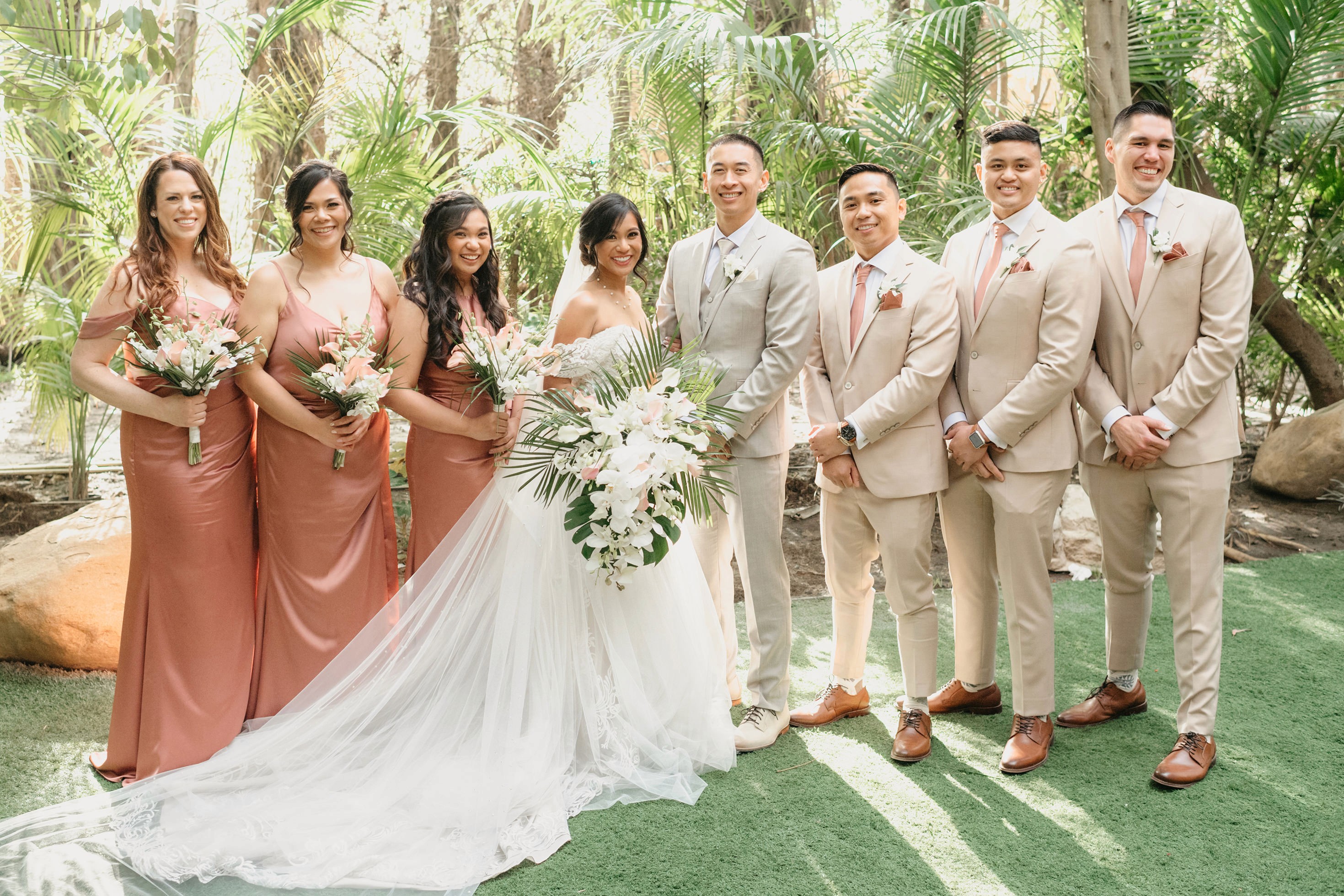 Flat lay wedding details with bouquet, rings, and sparkling bridal heels