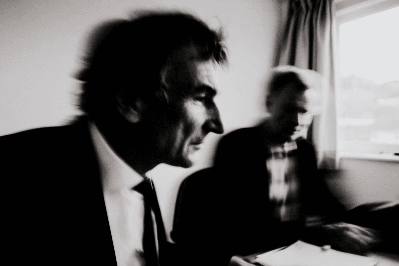 The image displays a large, illuminated advertising billboard at a street level, likely positioned to capture the attention of pedestrians and passing vehicles.