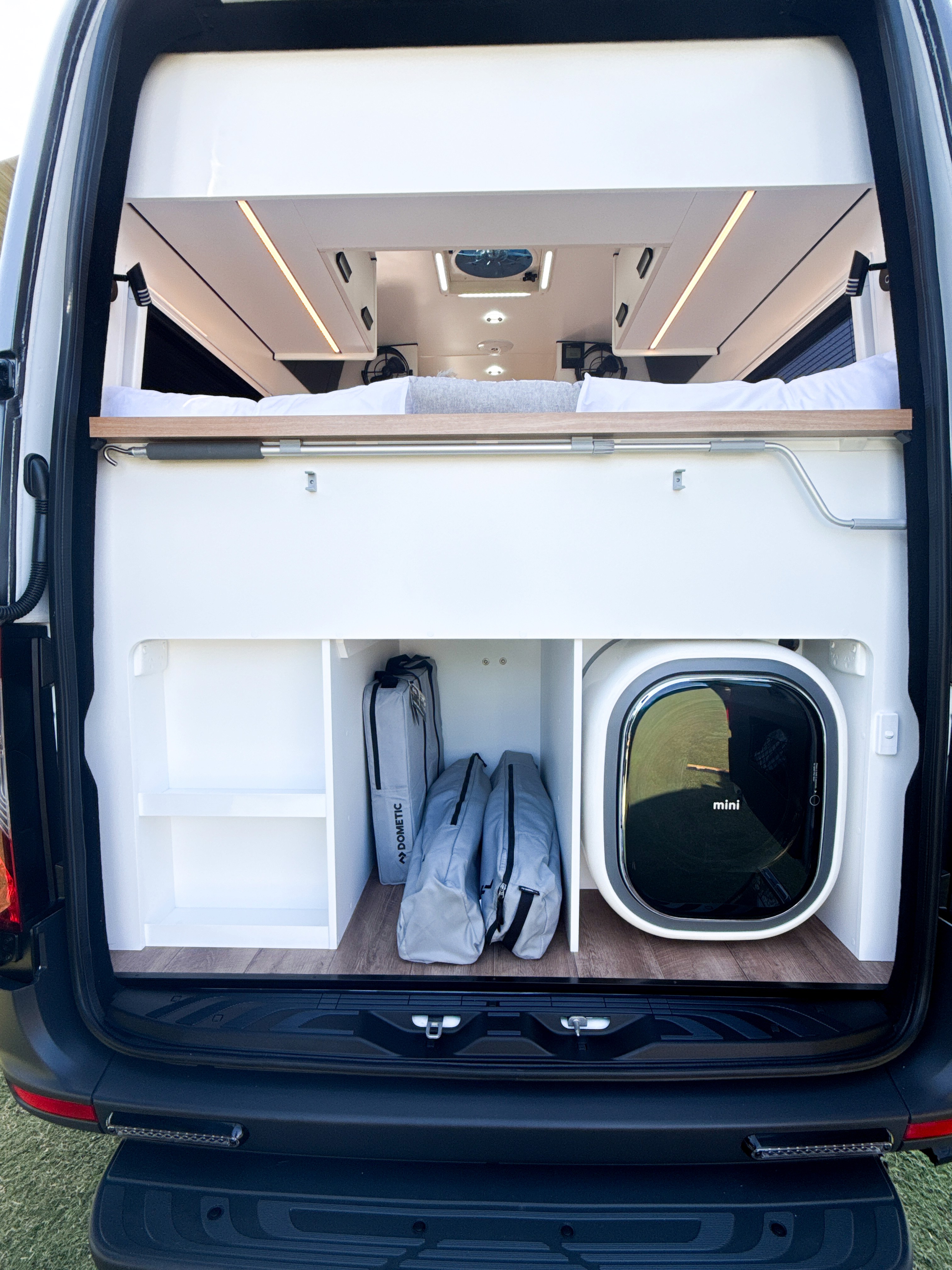 Rear campervan storage with Washing Machine