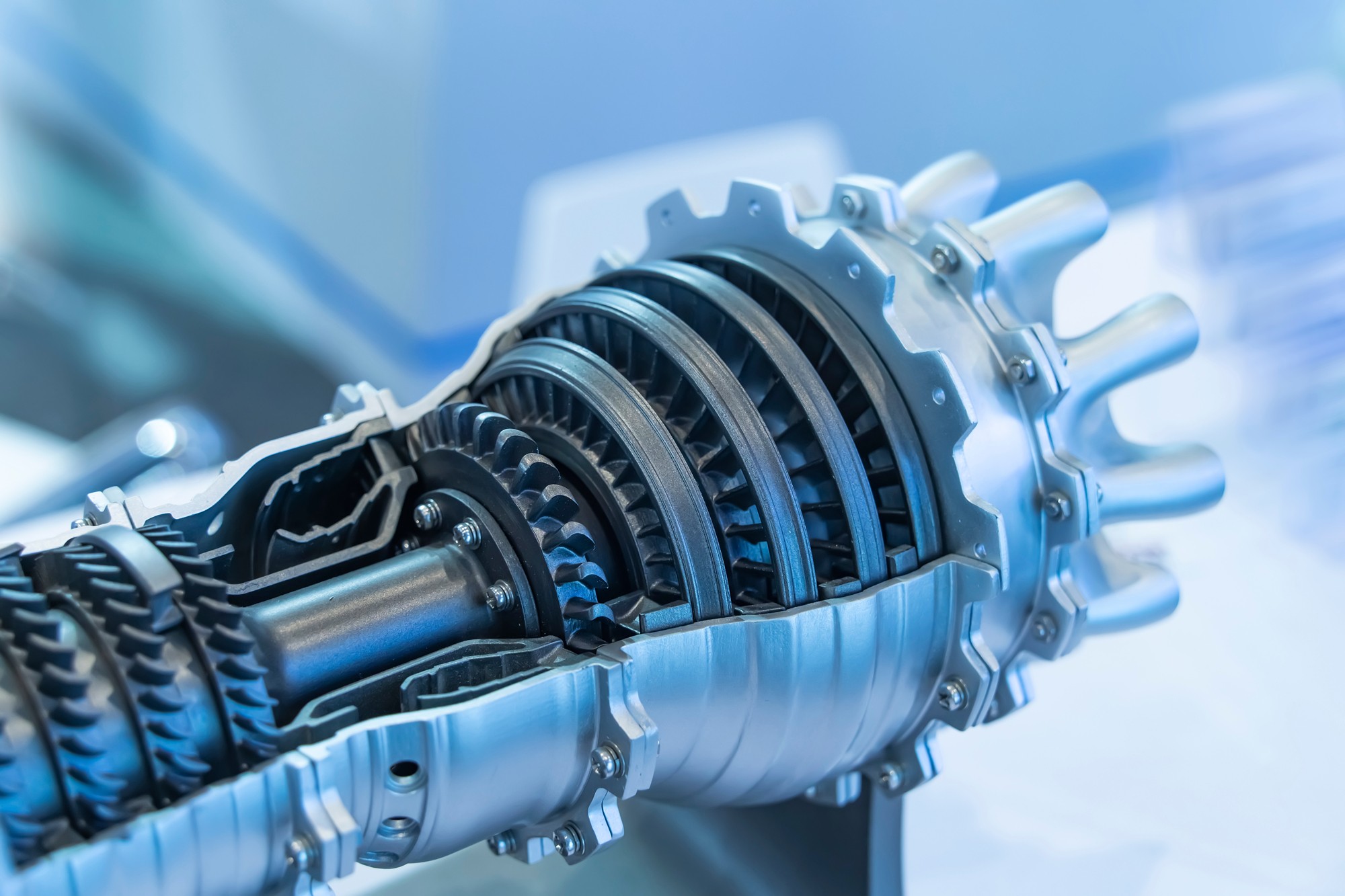 View of containers in motion at a large logistics hub located in a port.