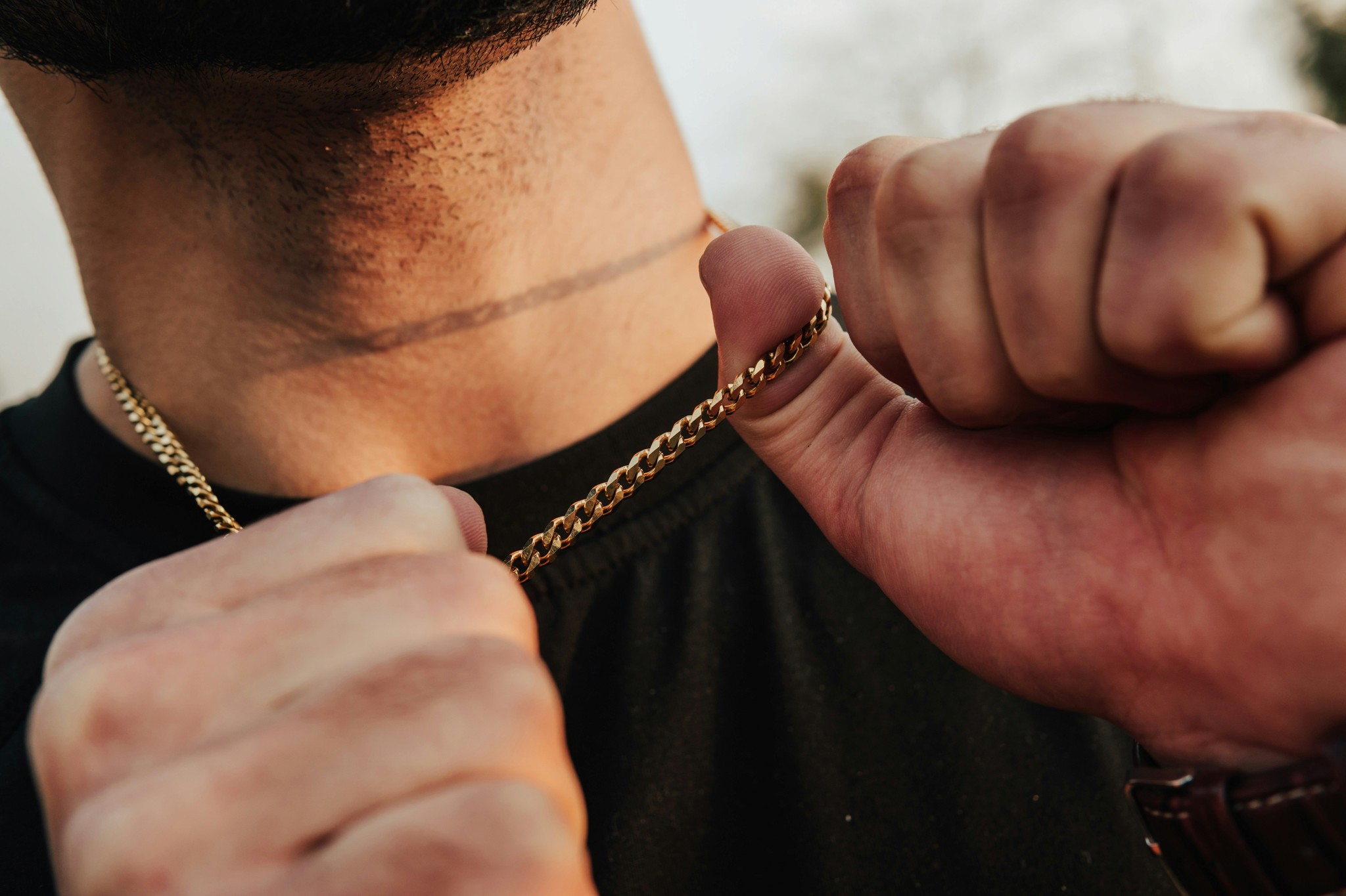 Lifestyle product photo featuring Cold Vault gold chain on model