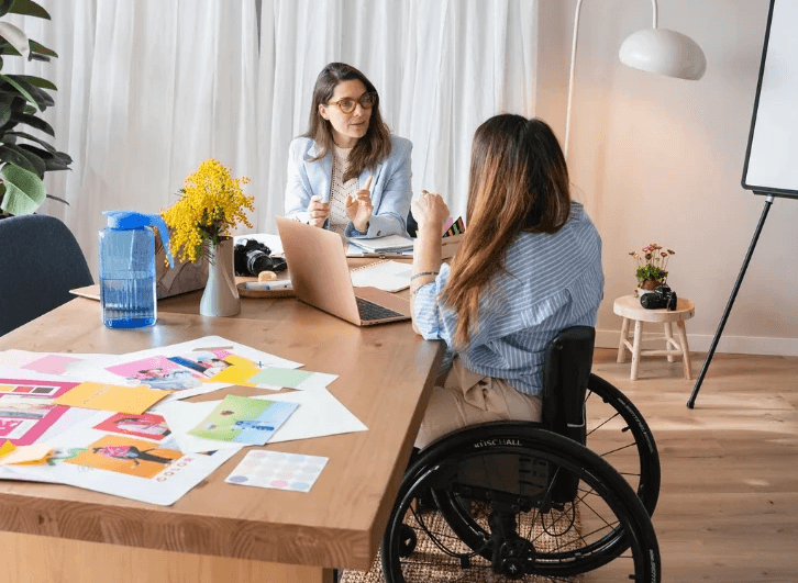 A cozy scene with warm sunlight casting stripes, featuring a potted plant and soft towels on a window sill.