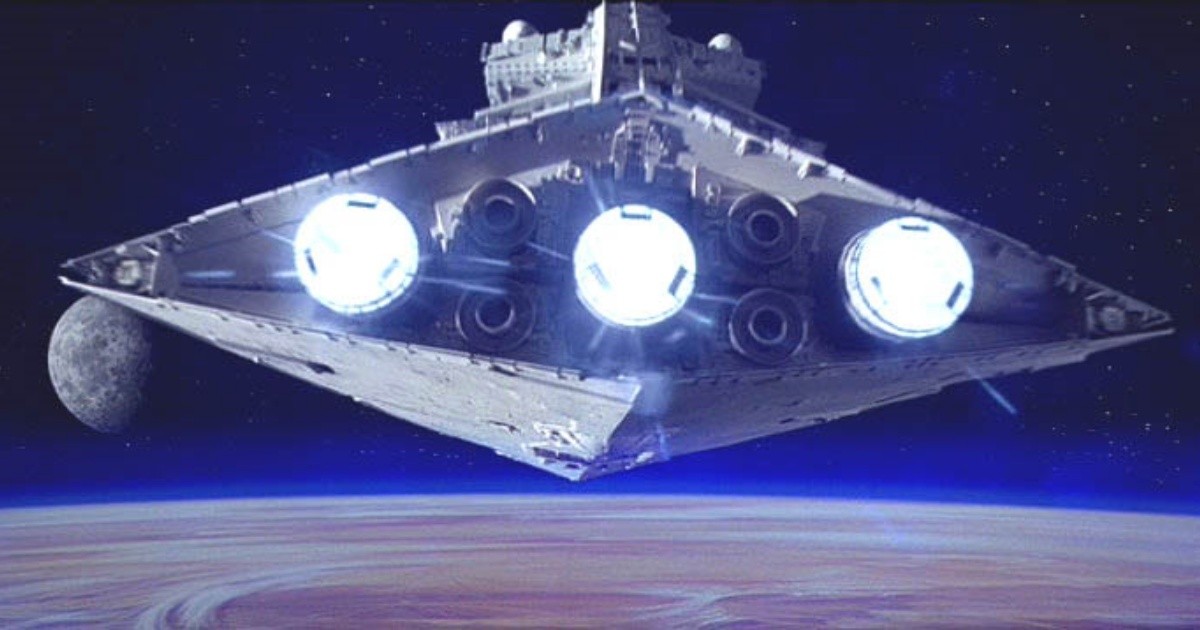 An imperial Star Destroyer over the desert planet Tatooine in the opening frame of 1977's Star Wars: A New Hope.