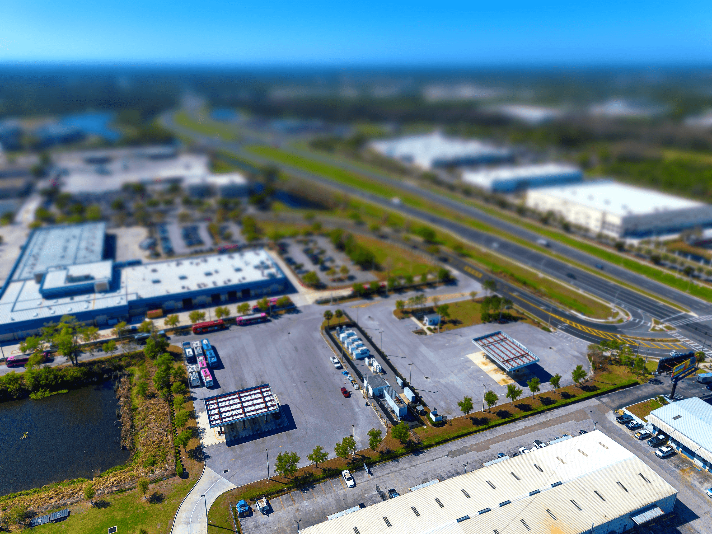 trailer truck passing on road near rail guard