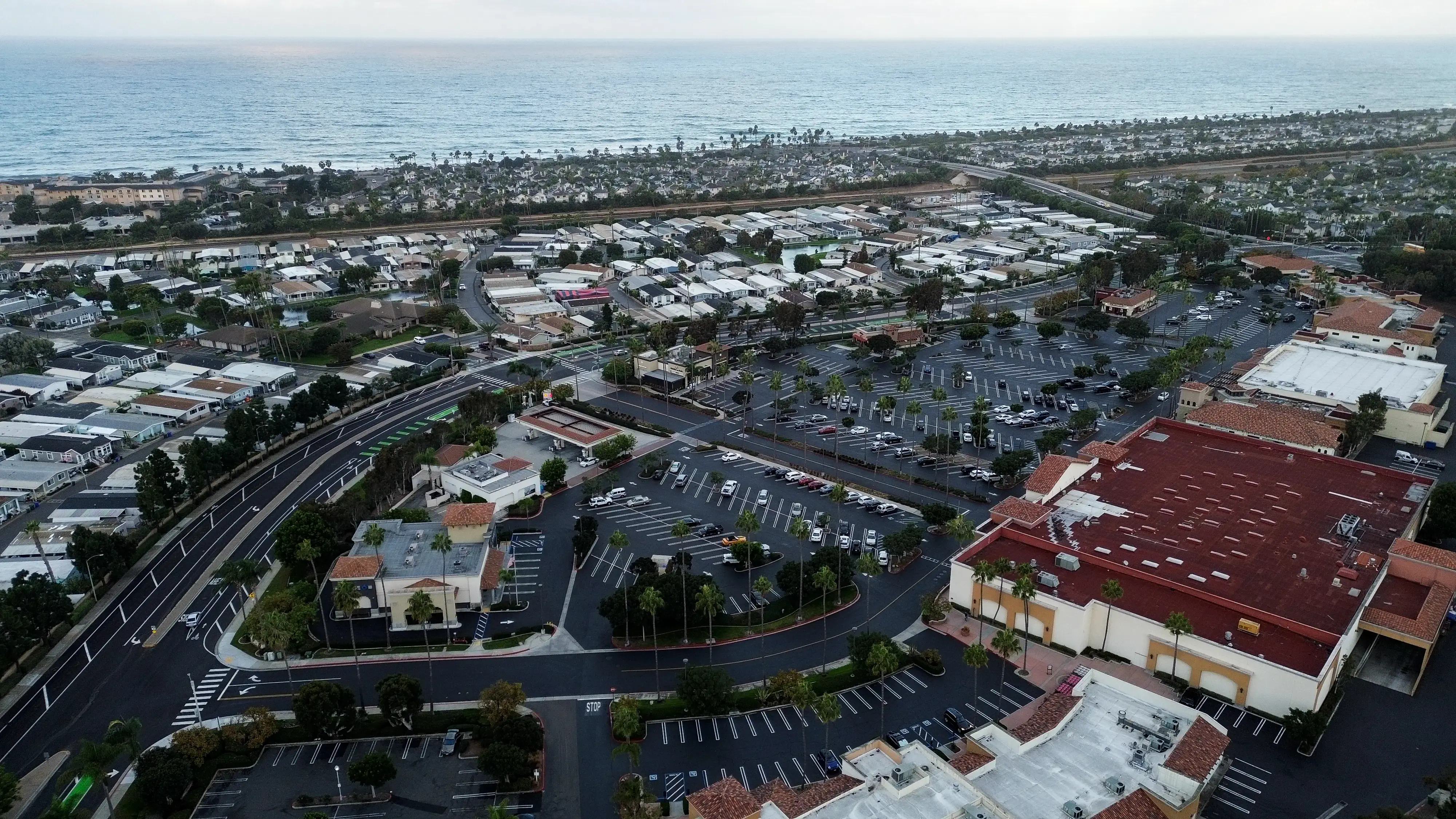 Aerial drone photo of freshly paved shopping center parking lot project