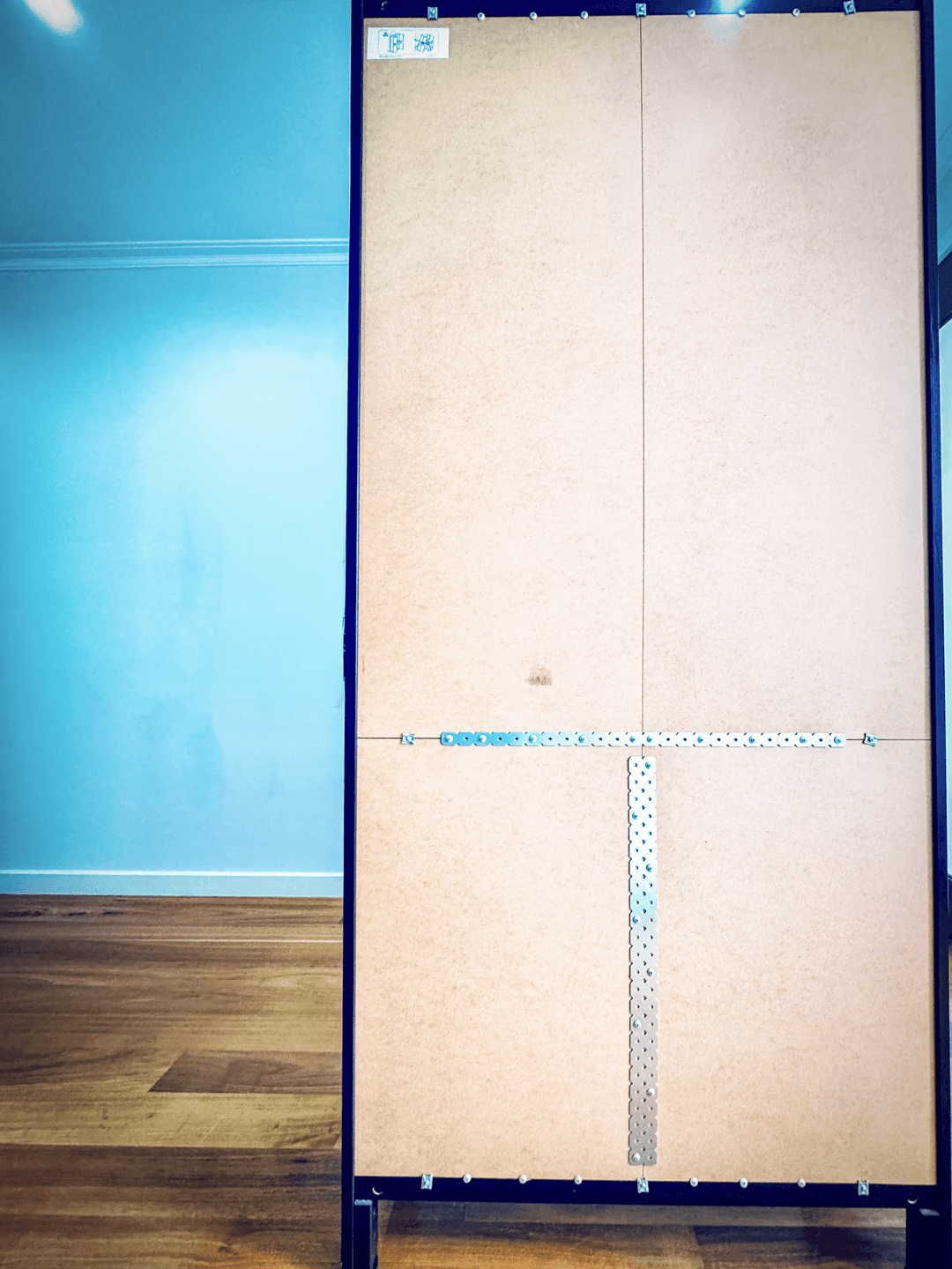 Bookcases reinforced with metal plates