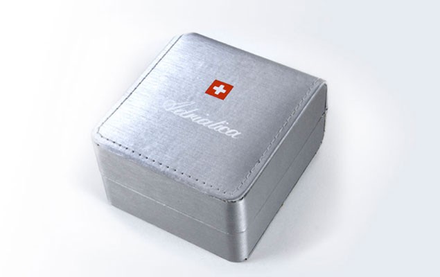 Adriatica watch box – silver textured cover with foil-stamped logo and Swiss cross. Designed by Abarel, manufactured to specification.