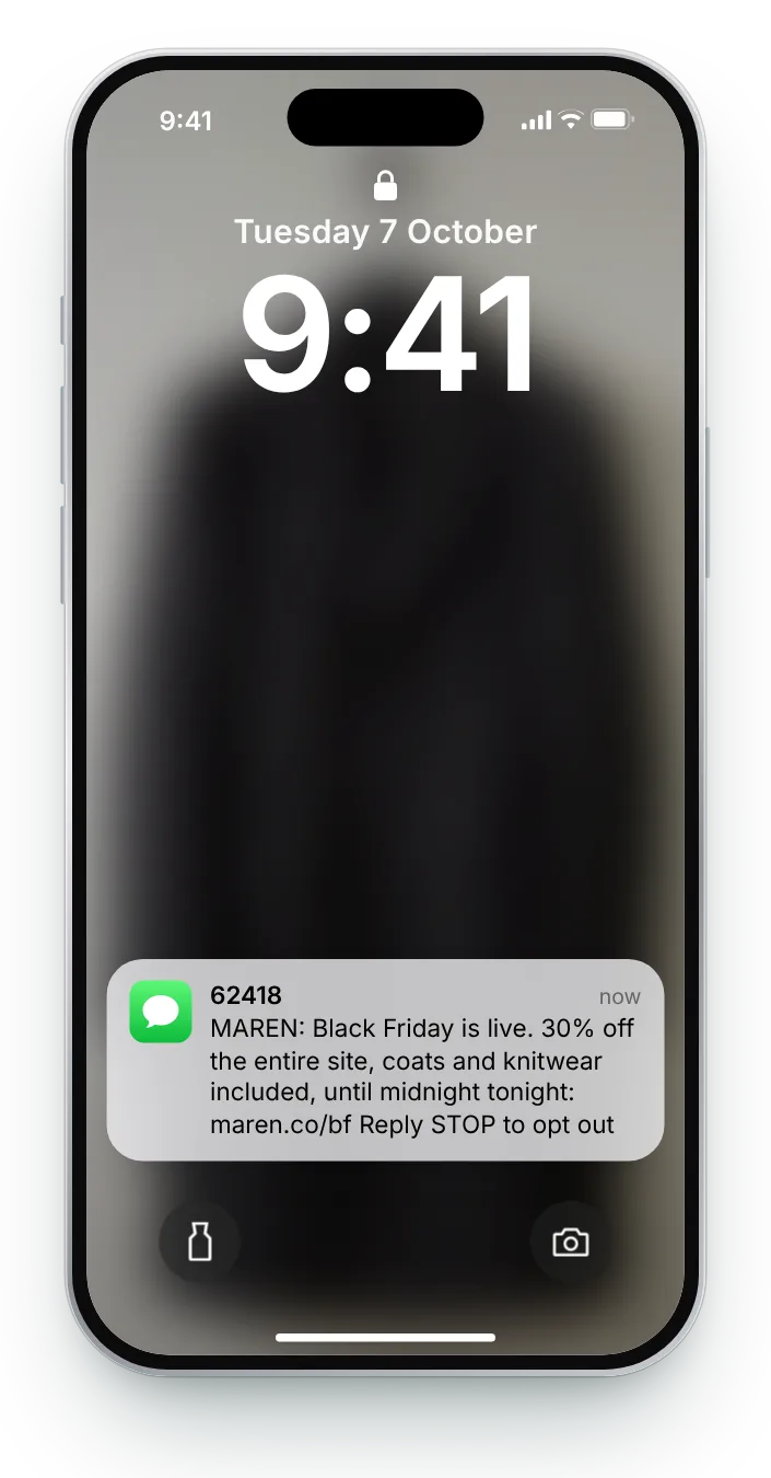 The Black Friday opening text as a notification on an iPhone lock screen