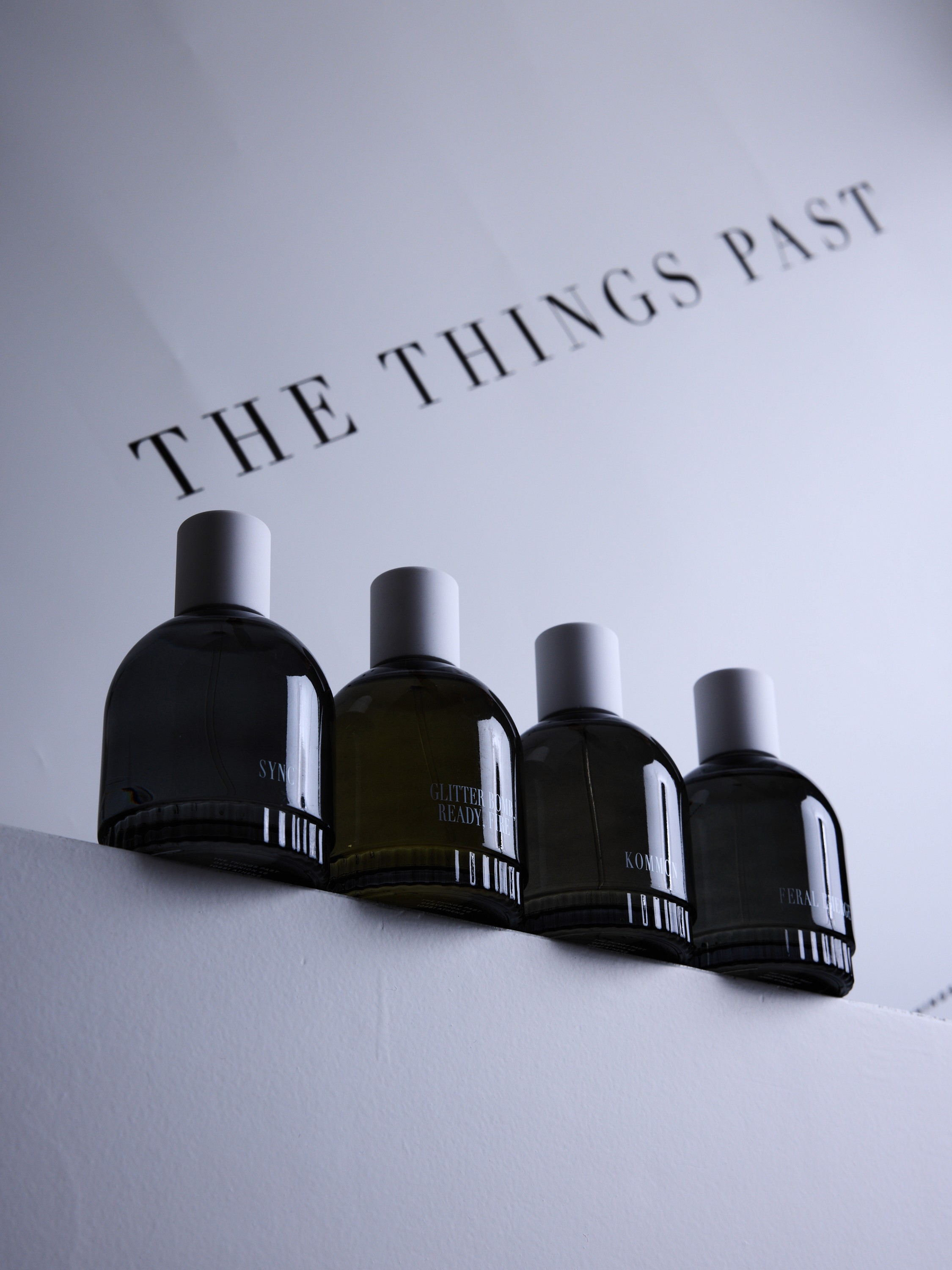 Stack of modern books and magazine with minimalist cover design on leather chair