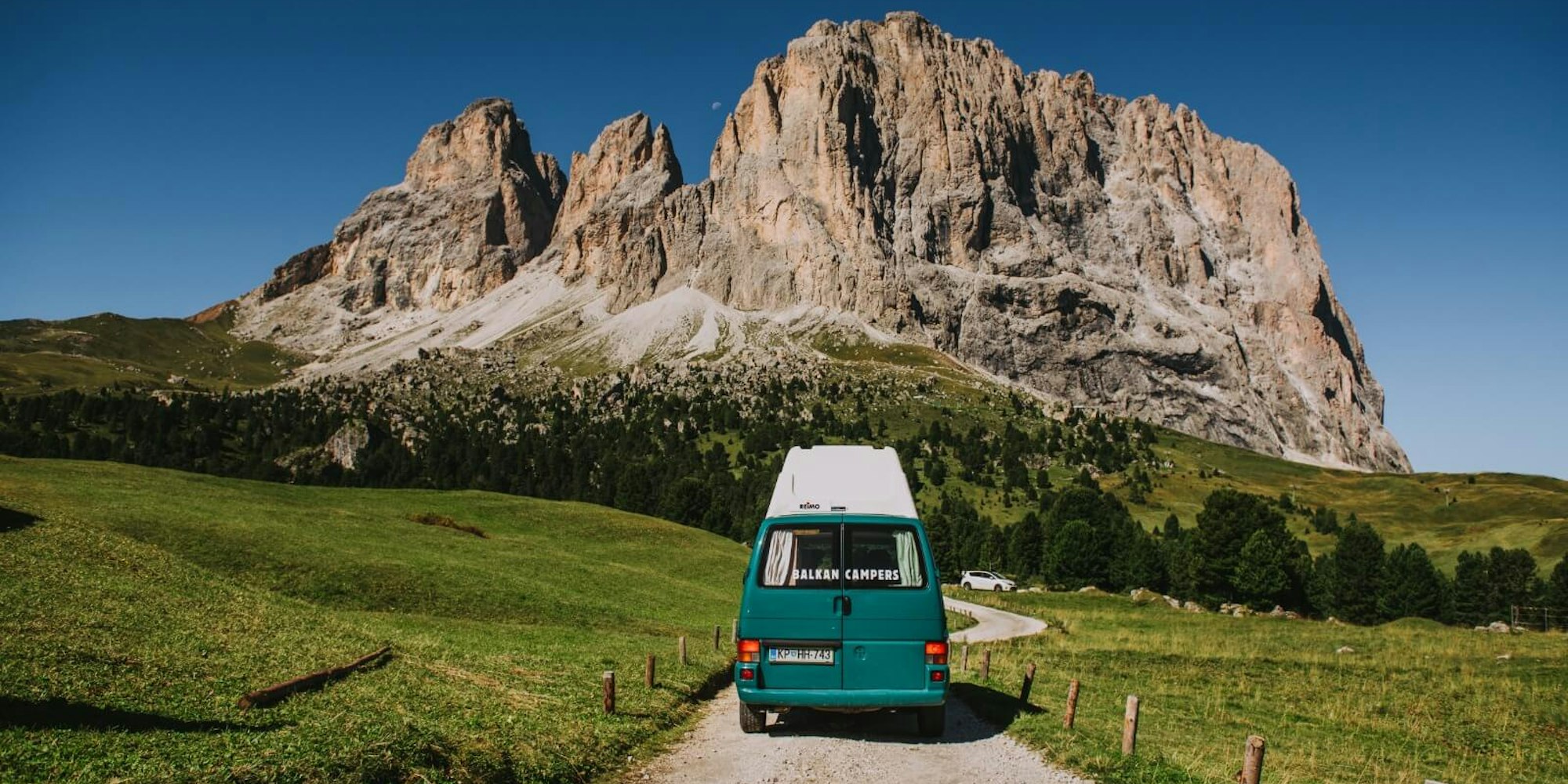 https://www.datocms-assets.com/136976/1734520389-campervan-in-dolomites.jpeg?auto=format&fit=crop&h=1000&w=2000