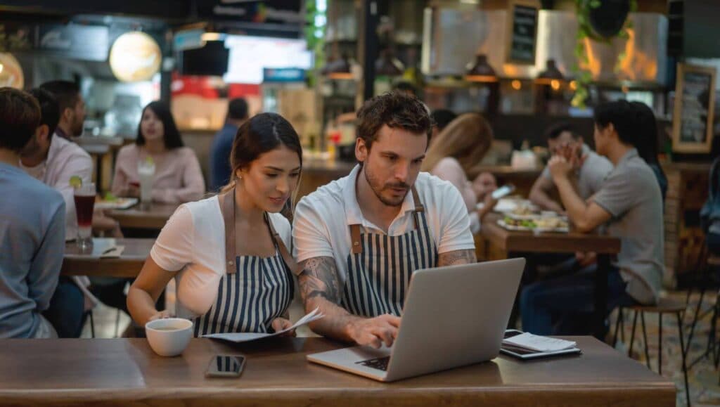 brown wooden kitchen cupboard near wall