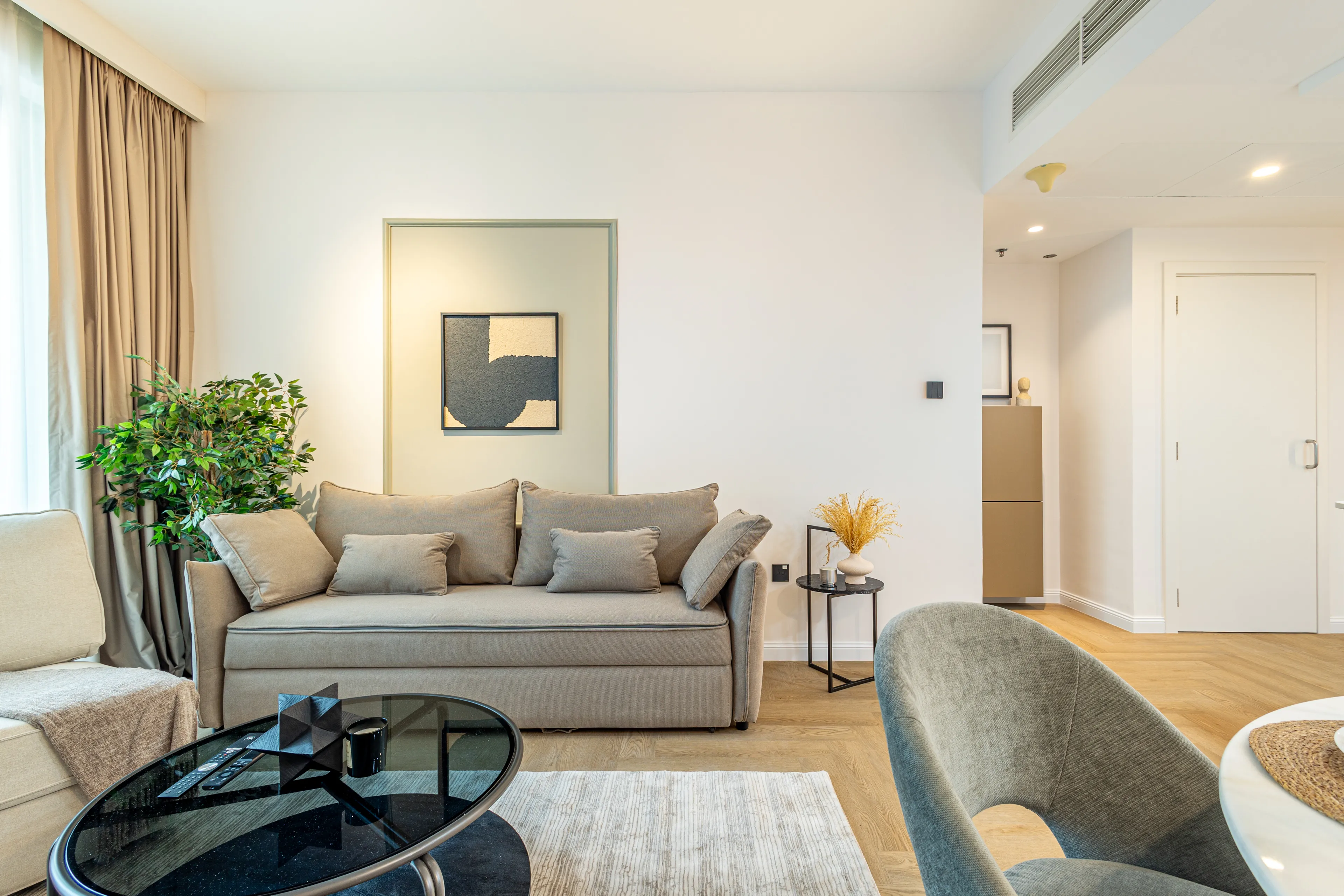 Living room with a cozy couch.